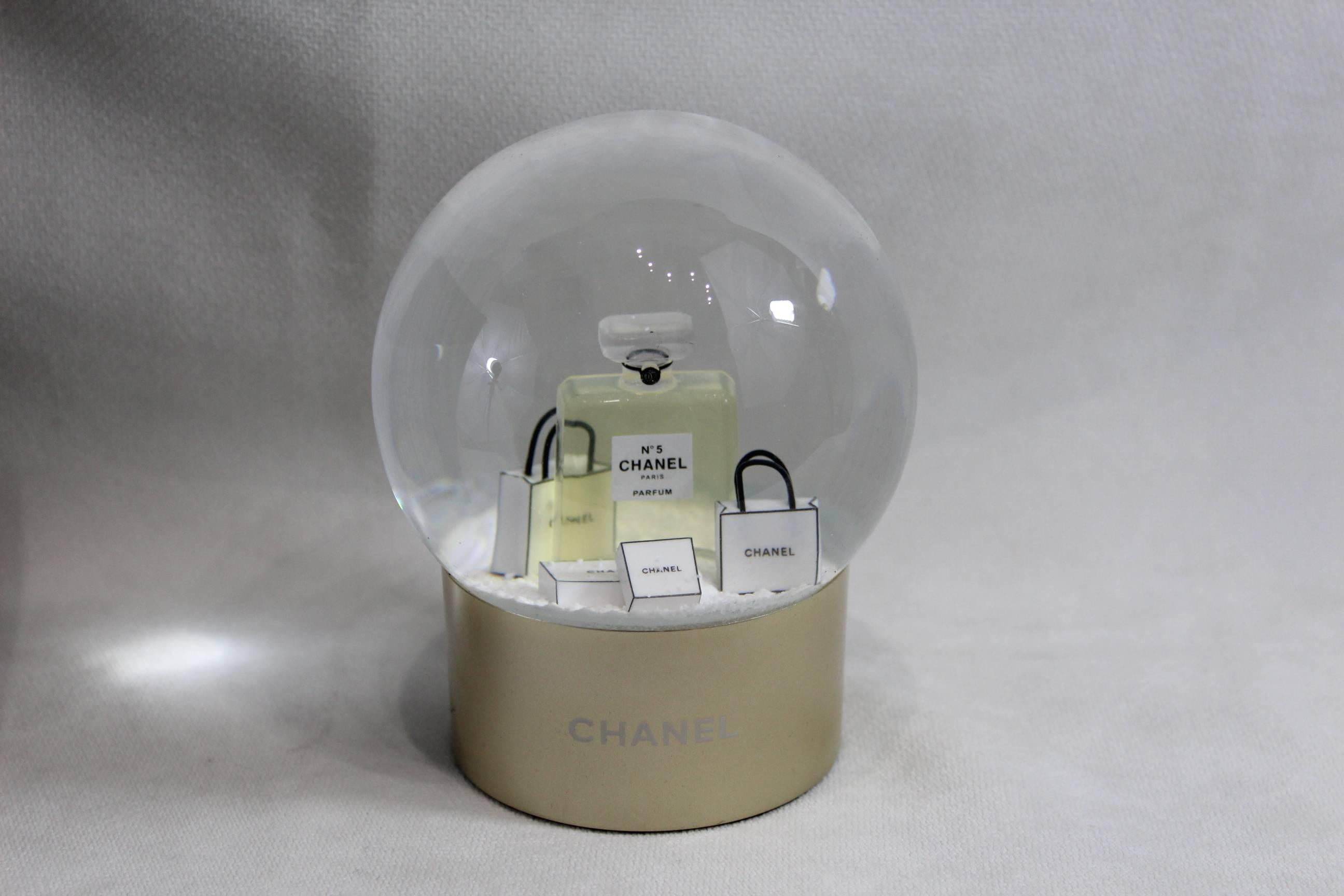 Gray 2015 Chanel Snowball / dome representing the iconic shopping bags