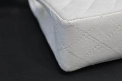 Vintage 80's Chanel 2.55 Bag in White Letaher and Golden Hardware. size 10"