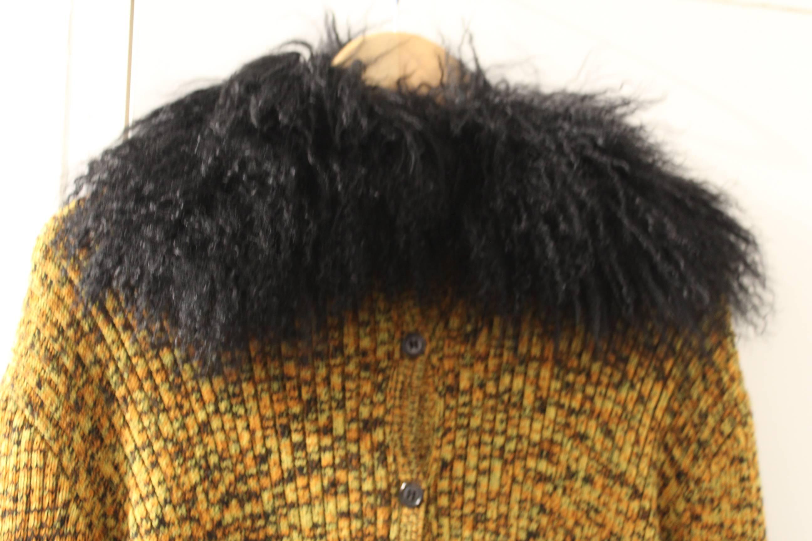 Really ncie vinateg wool and mohair wool pullover from yves saint Laurent fur collection.

Really good conditon.

Size European 40