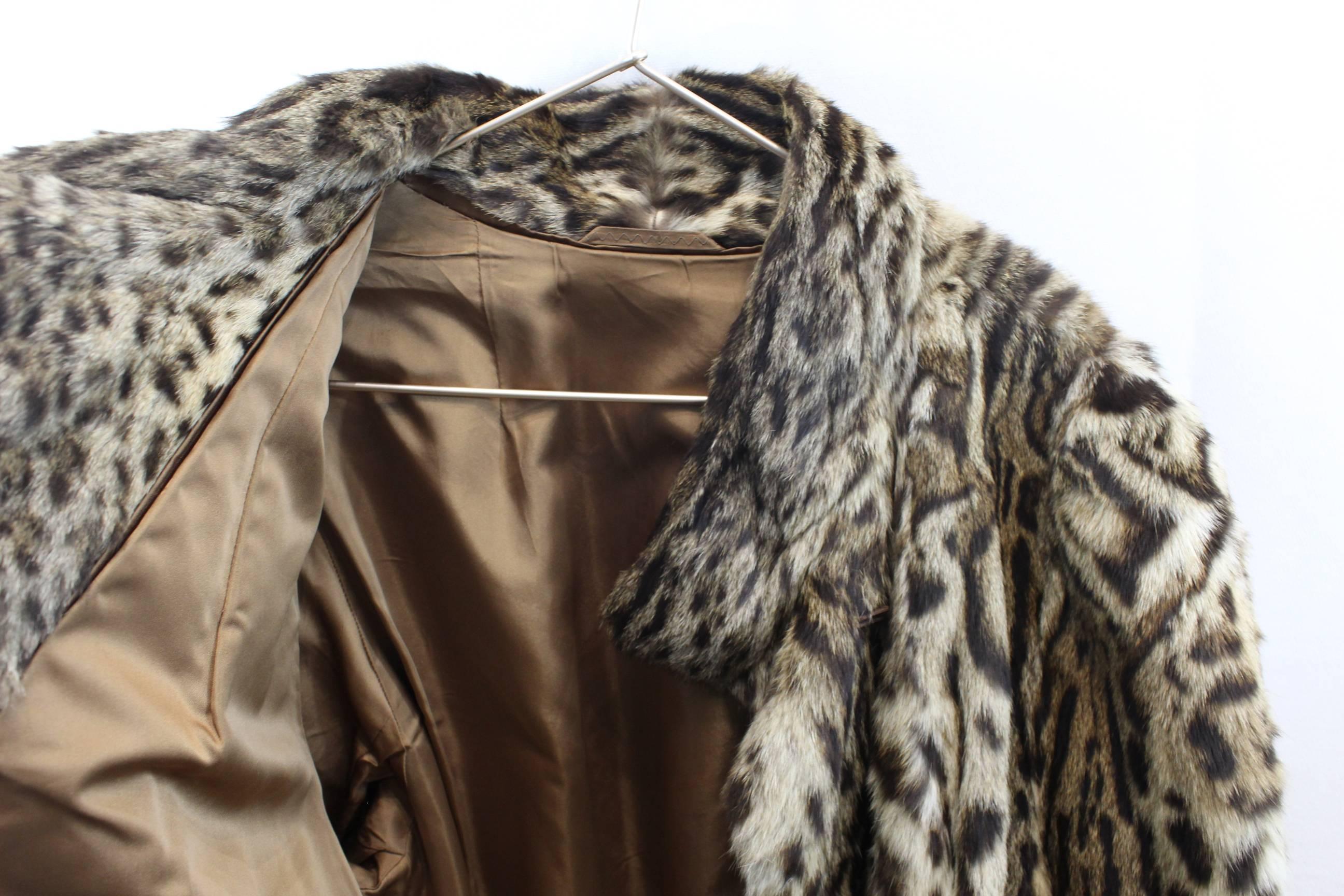 Gorgeous Wild cat coat ( not 100% about the fur type but it is super soft, probably wild cat fur) 

Made bespoken

Really nce condtion.

Size M (40 european) 
From shoulder to shoulder 1,5 inches