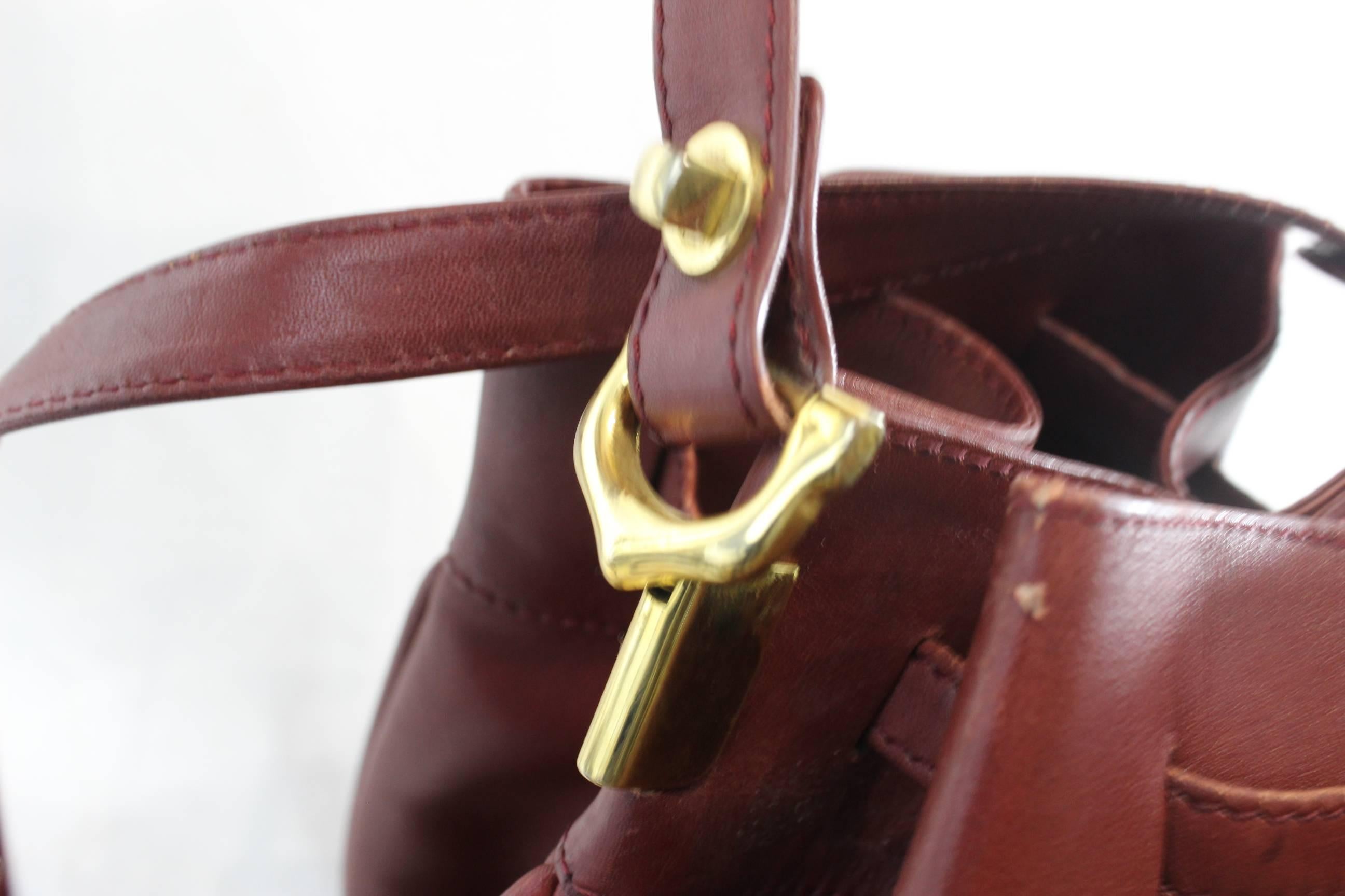 Black Cartier Vintage Burgundy Bucket Style Bag.