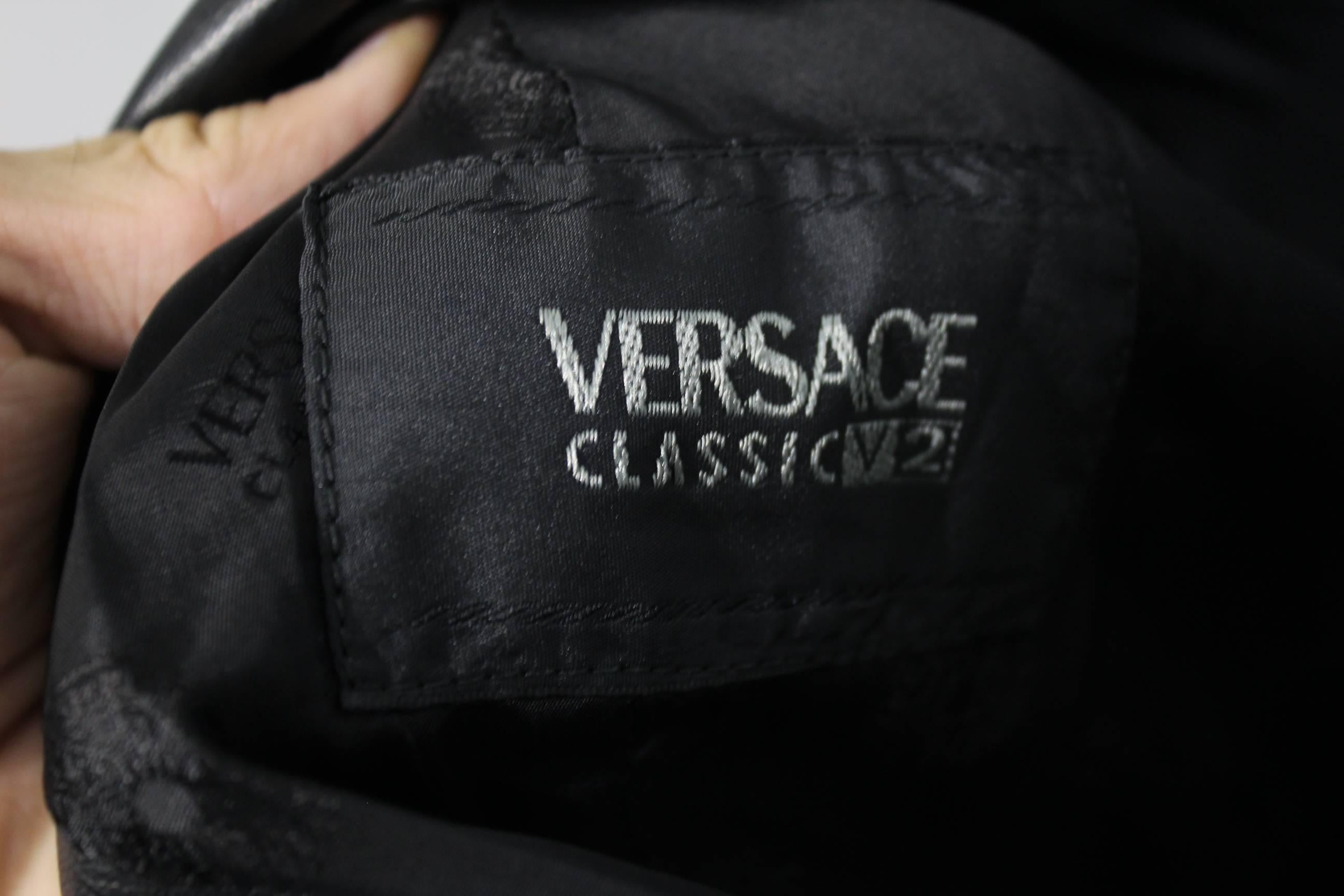 Women's Versace Leather Dress and Leather Jacket with golden atributes