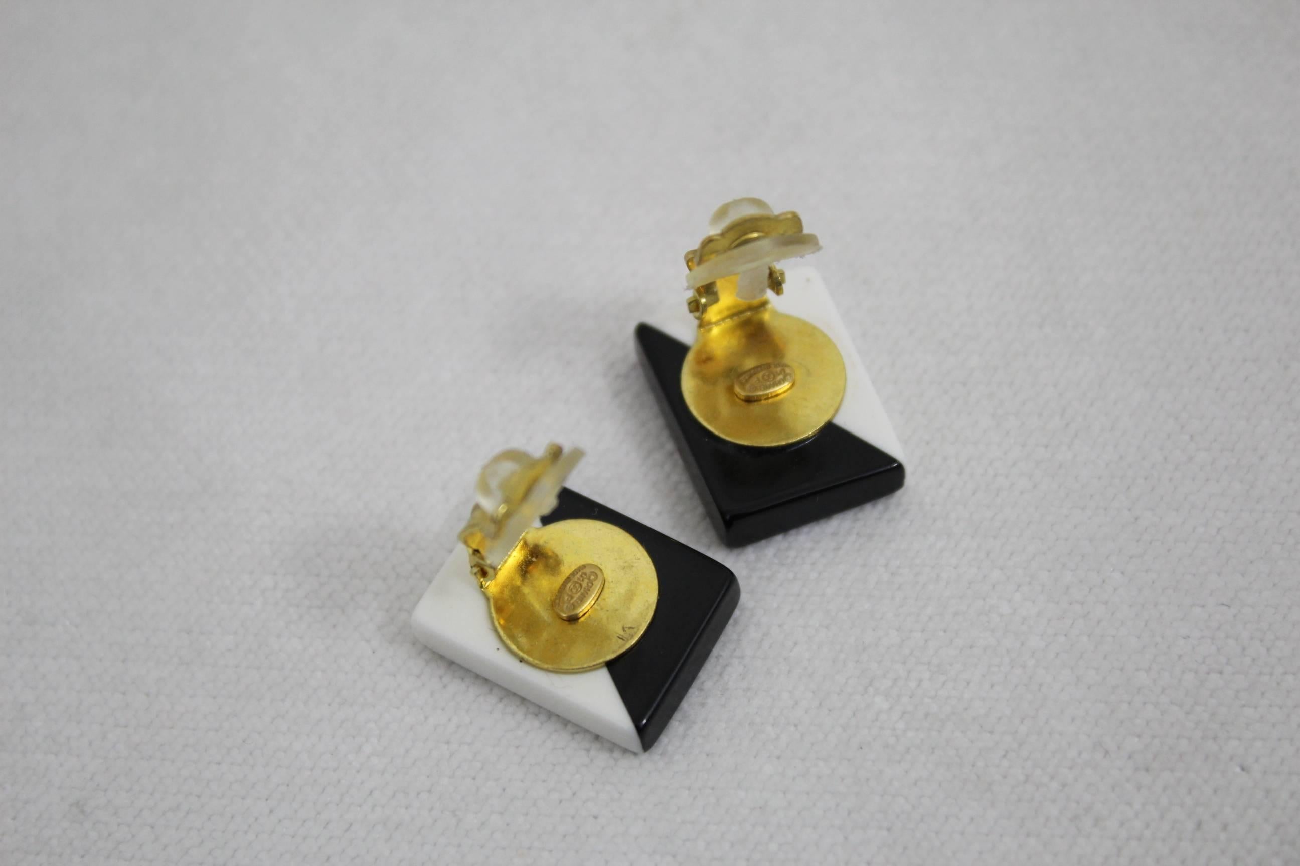 Women's or Men's Chanel Bakelite and gold plated metal Earrings For Sale
