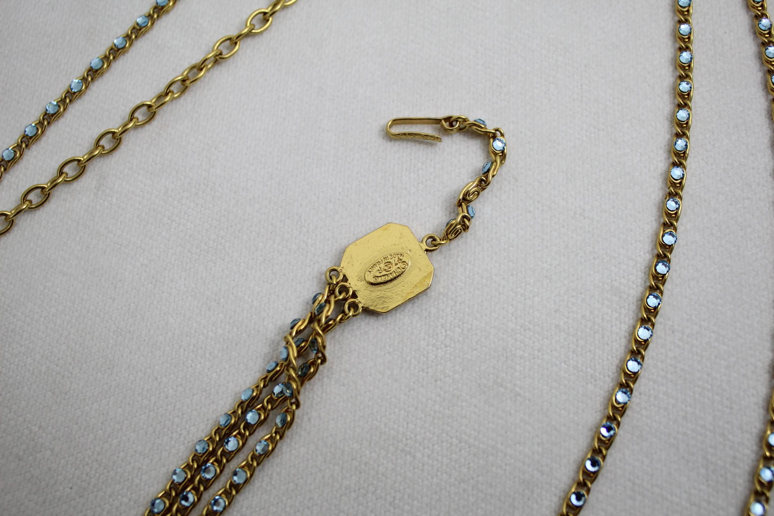 Women's Sophisticated 1997 Chanel Necklace with blue stones and gold plated metal.