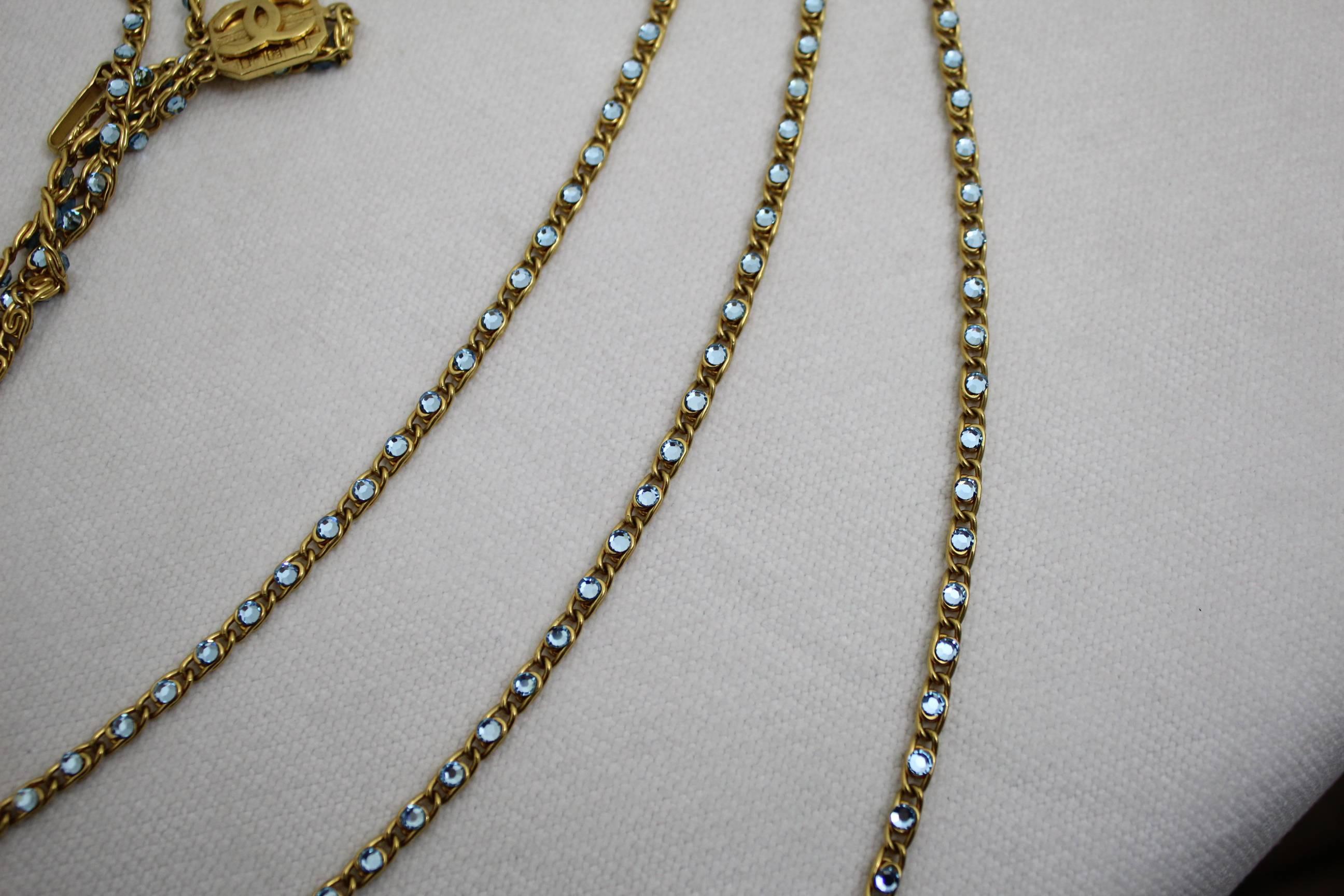 Sophisticated 1997 Chanel Necklace with blue stones and gold plated metal. 2