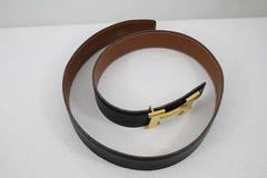 Hermes reversible H Constance Black and Gold Leather Belt. Size 68 (27 inches)