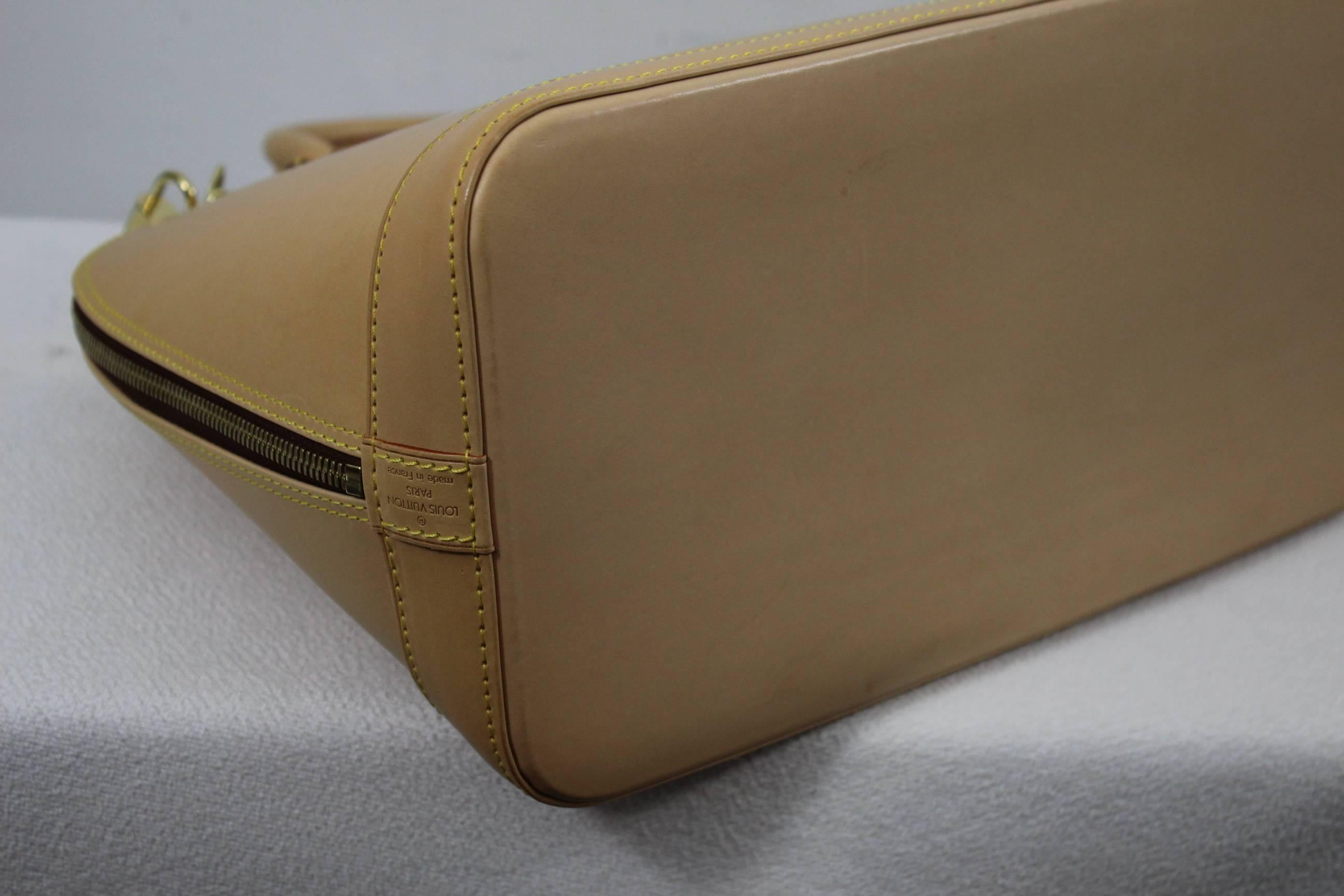 Women's Alma Louis Vuitton Bag all in natural leather.