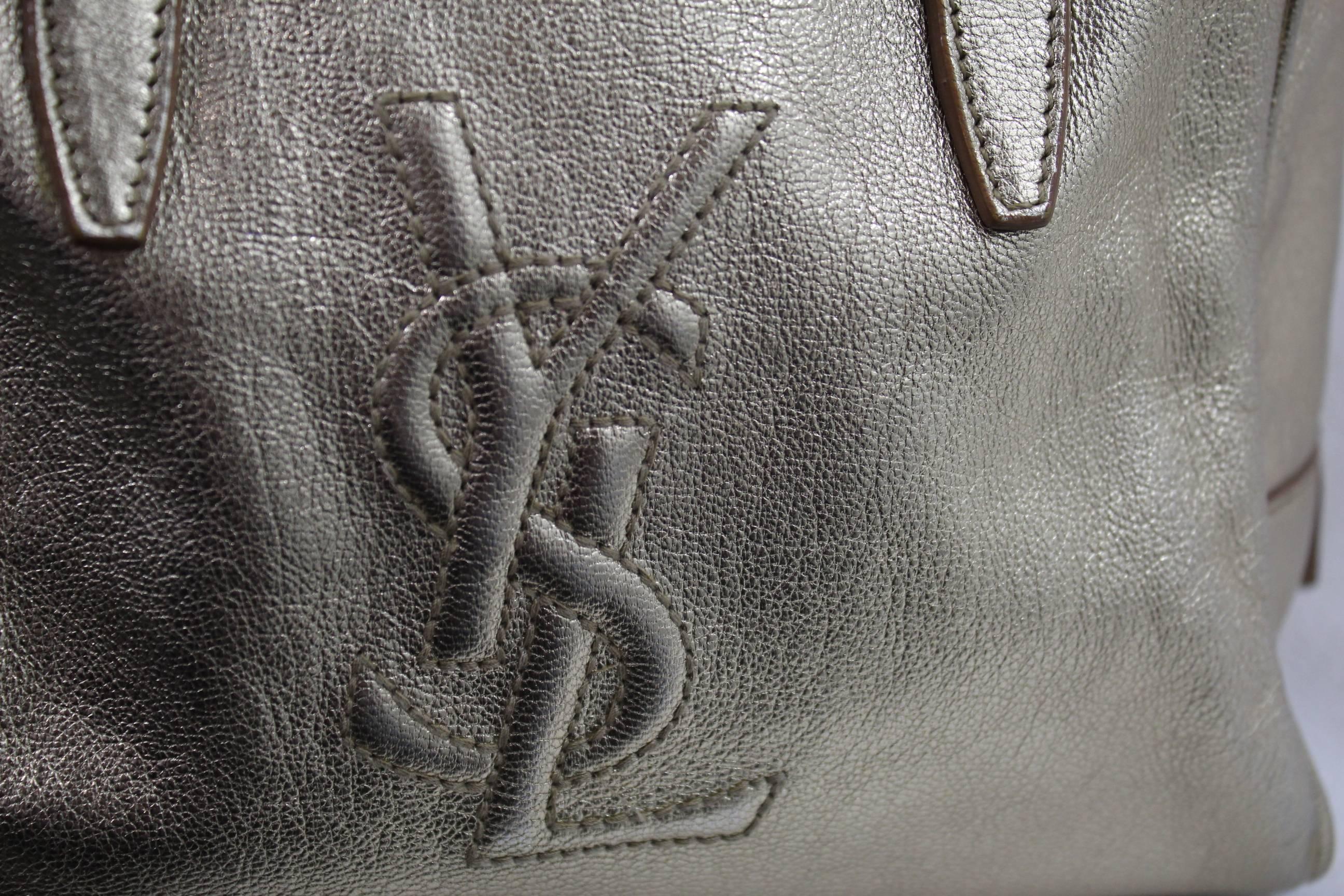 Lovely Golden Leather Yves Saint Laurent handbag 3