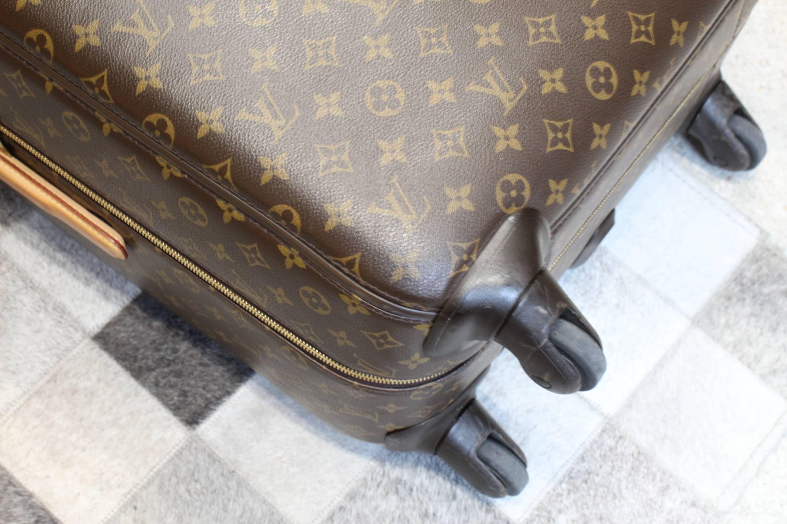 Gray Louis Vuitton Zephyr 70 Suitcase. Really good condition. Wiith Protective Bag