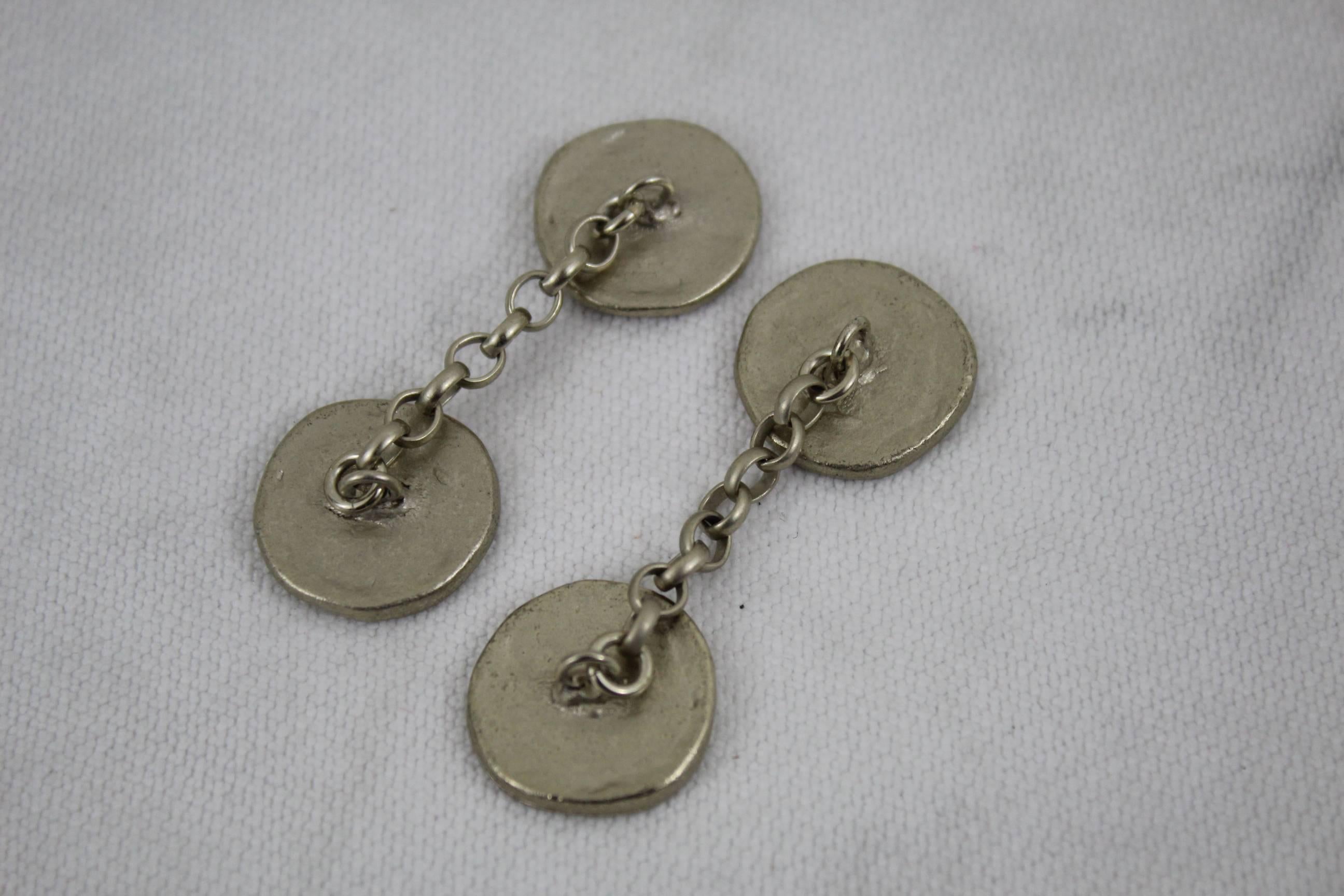 Nice pair of long Chanel Steel Cufflinks from late 80's belonging to a haute couture suit.