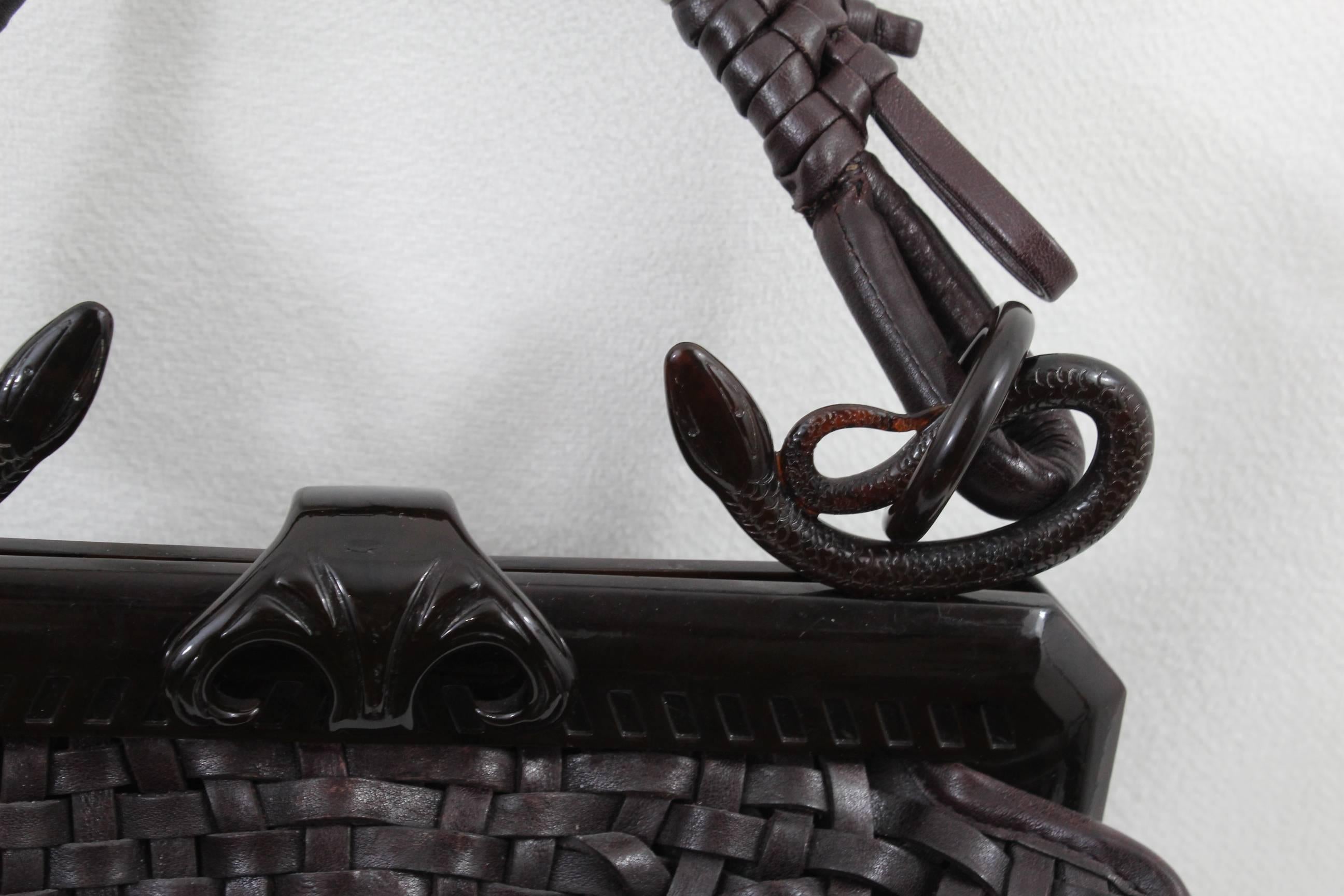 Really nice bag in dark brown leather with snakes in the handles  2007 collection by John Galliano.

Some light signs of use in the corners but overall really good condition.