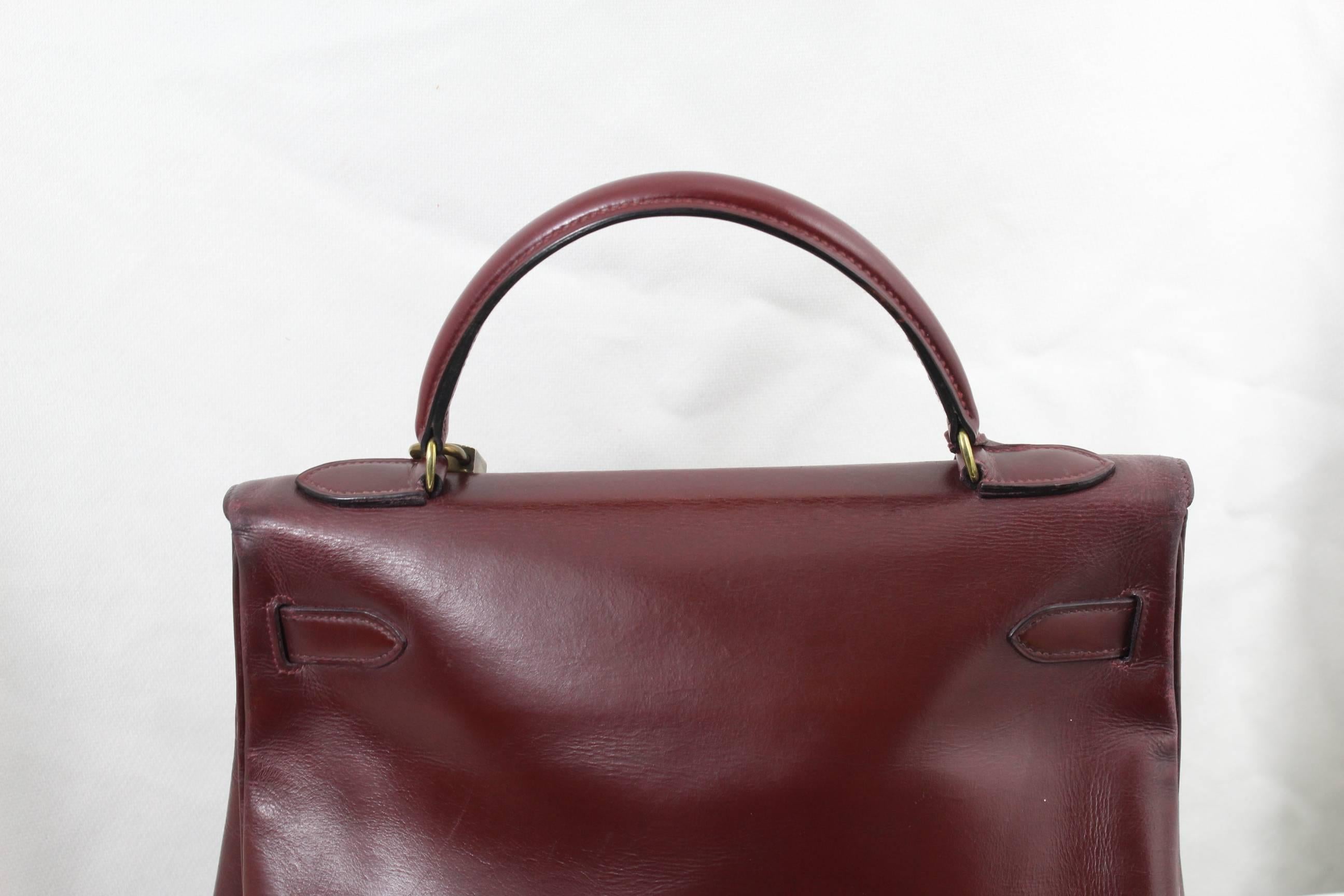 Women's or Men's 1960 Hermes Vintage Kelly Bag in Burgundy Leather with Golden Hardware