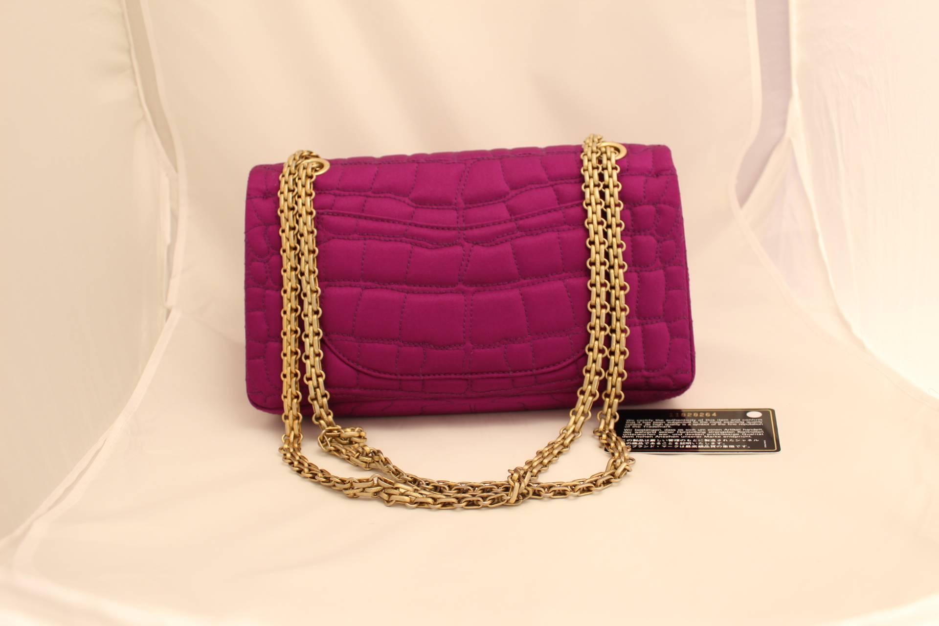 Red Chanel 2.55 Double Flap bag with golden hardware