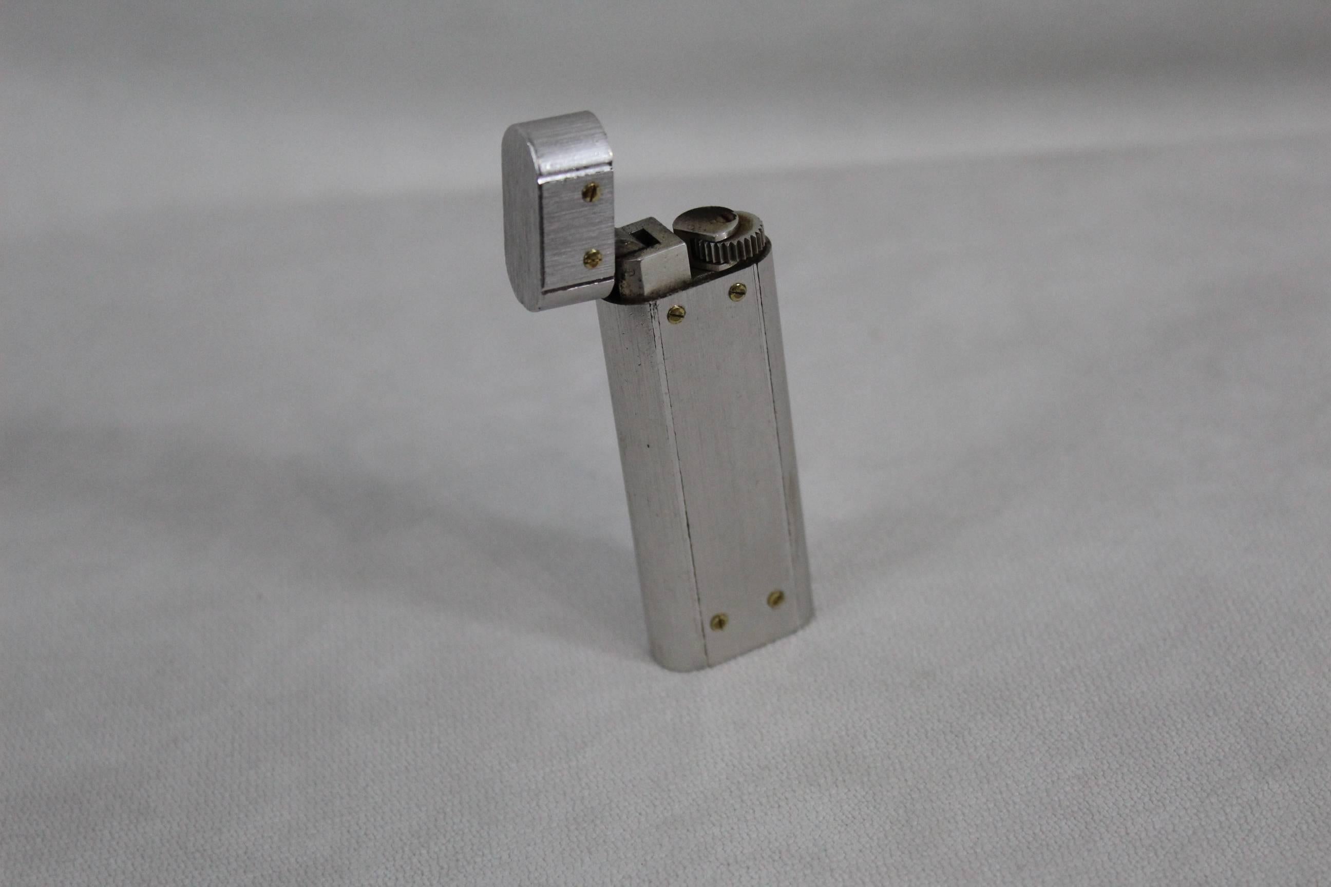 Nice Cartier Vintage Silver lighter in good condition. It is working.