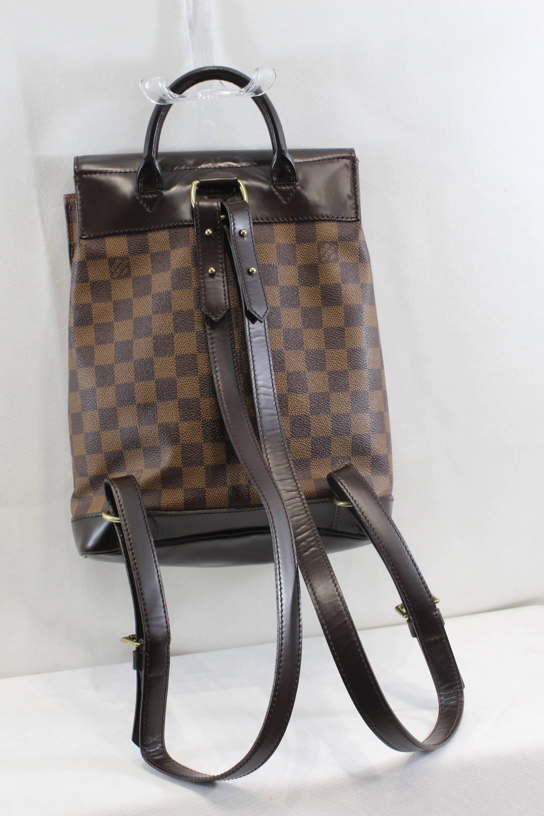 Really ncie Louis Vuitton Soho Backpck in damier ebene and brown leather.

Really good conditoon.

from 1999

11x9