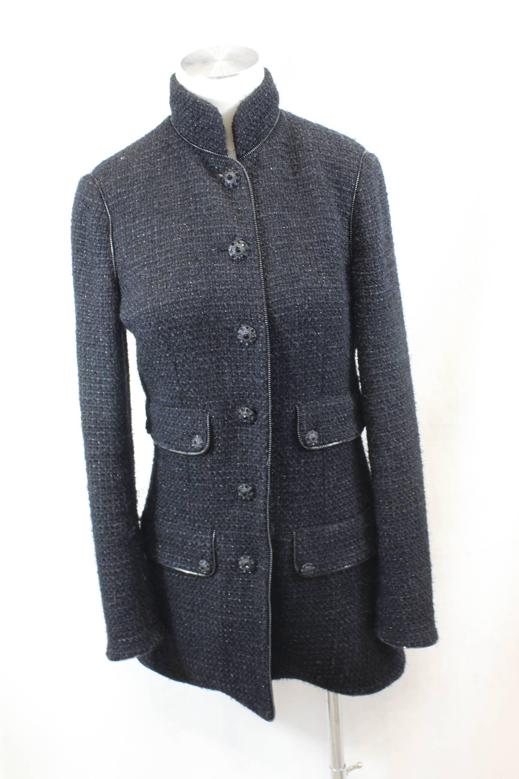 Nice Chanel tweed Jacket from 2010 Collection.

The jacket is decorated with zips aall over it.

Nice condition some small sign of use but nothing really noticeable
