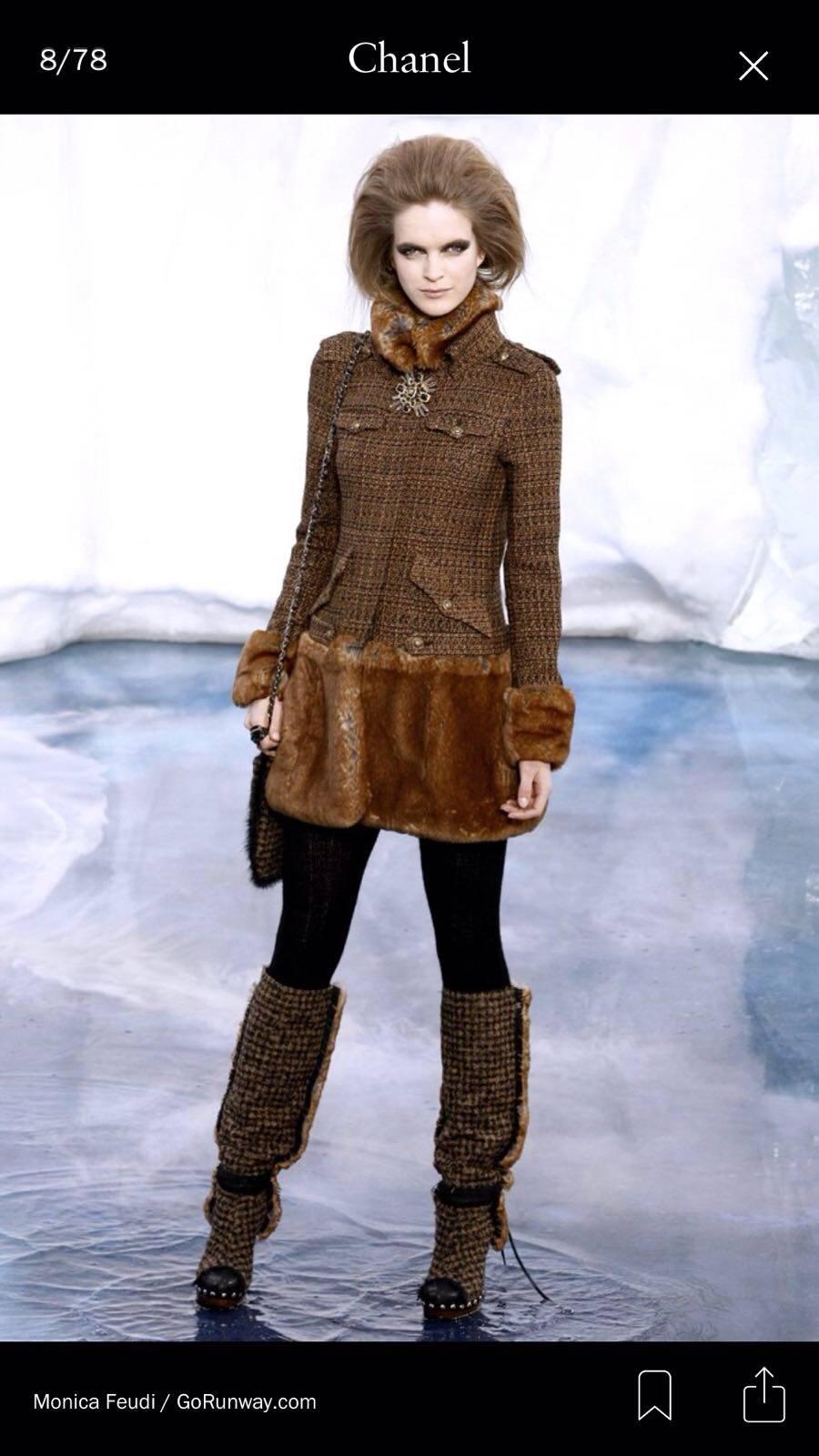 As seen on runway Chanel Coat in tweeed and fake fur from the Fall 2010 Runway.

Size 38 fench

Good condition but please notice that some small stones in the buttons has been lost ( see image number 3)

removable fur collar

Label Marked Smple