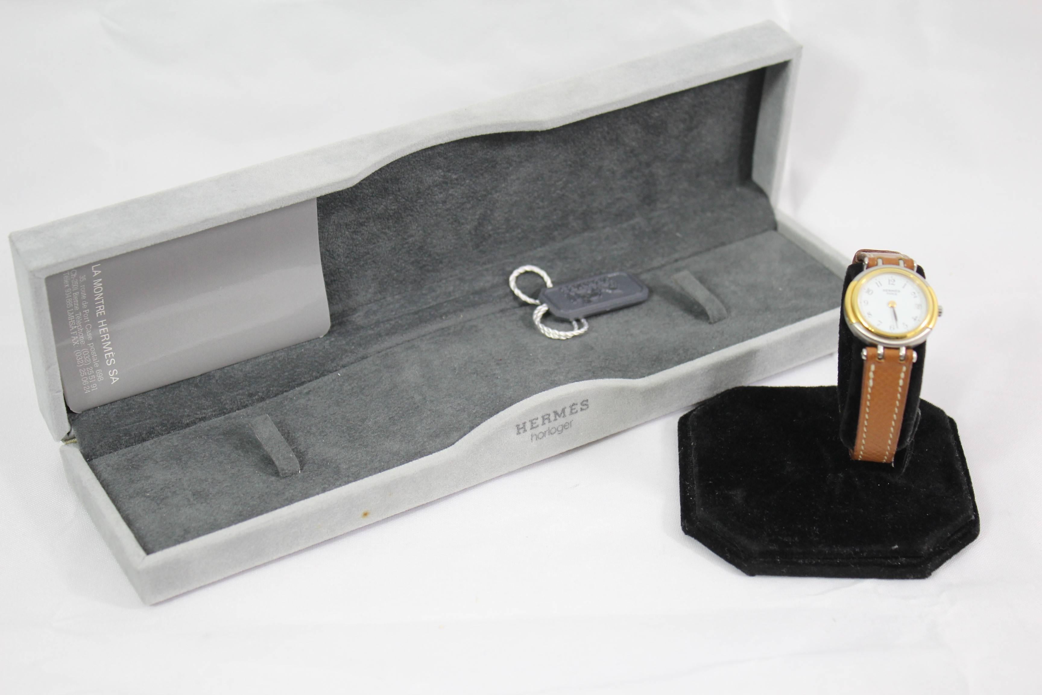 Hermes Windsor watch in steel and gold with leather band.

Good condition.

Sold with box.