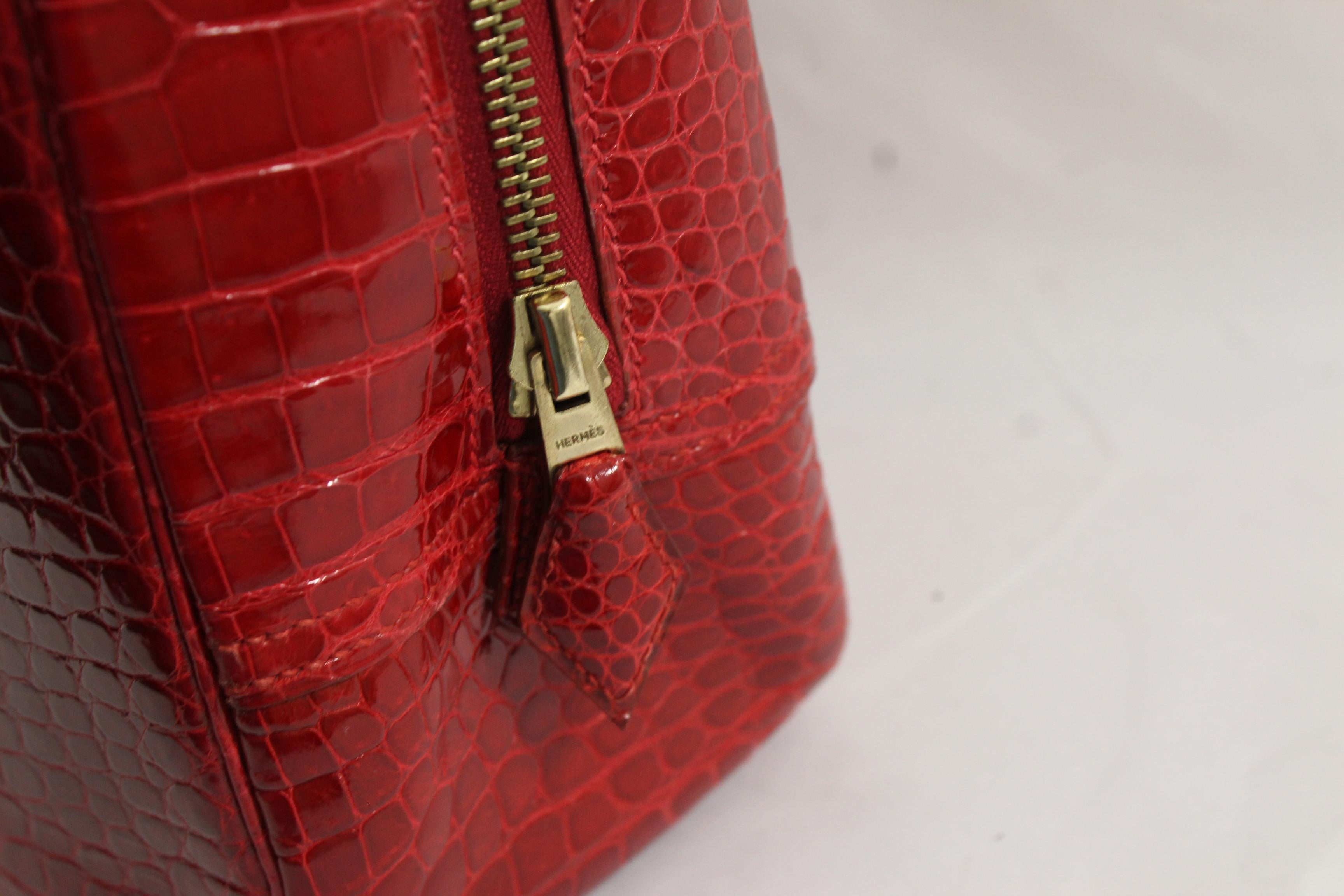 Women's or Men's 1998 Hermes Plume in Red Porosus Crocodile Leather. Excellent Condition