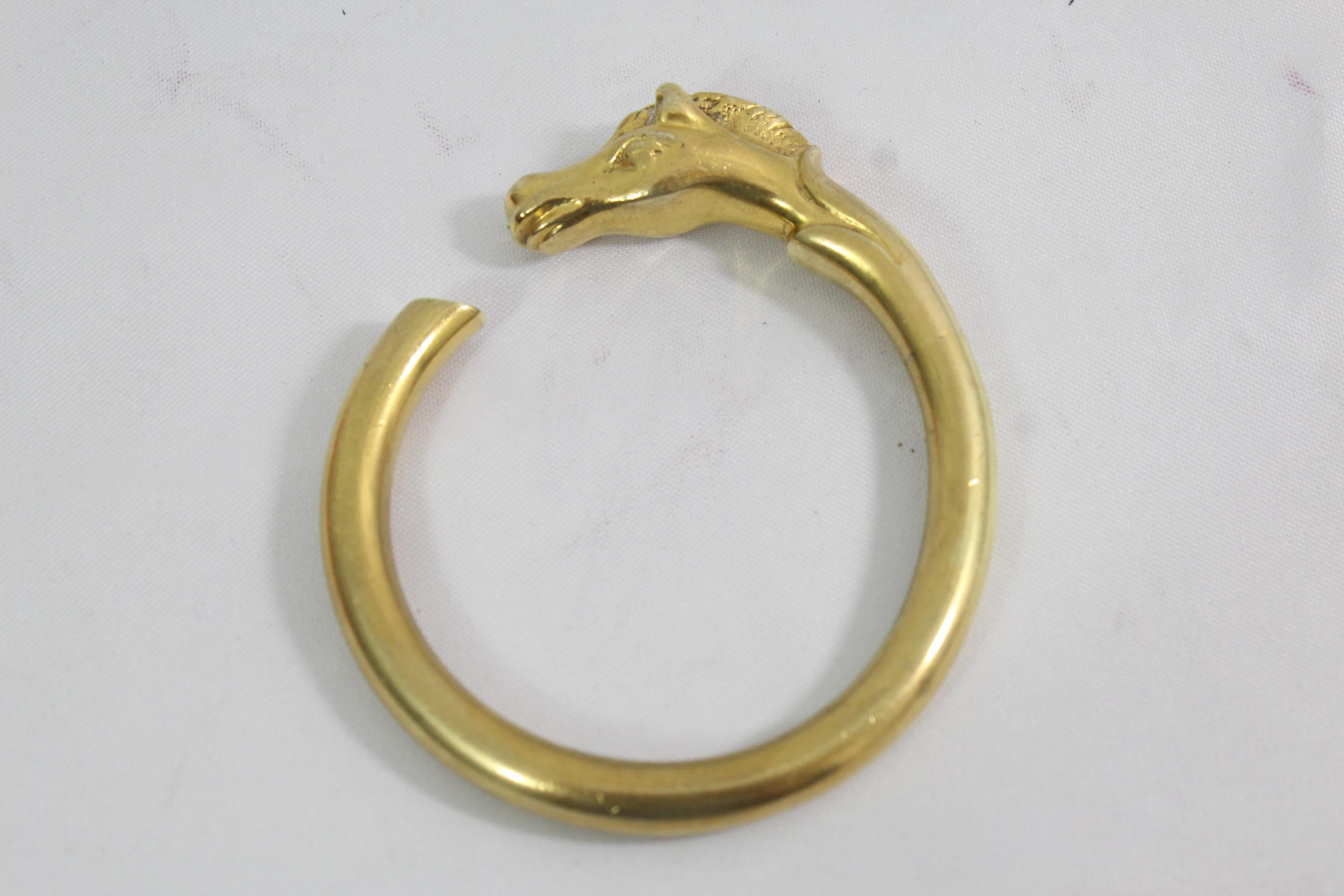 For sale  vintage Hermes Bangle in Vermeil ( golden Silver)representing a horse.

Good condition but some signs of use due to its age.

This is one of the most mythical bangles from Hermes

Sold with box