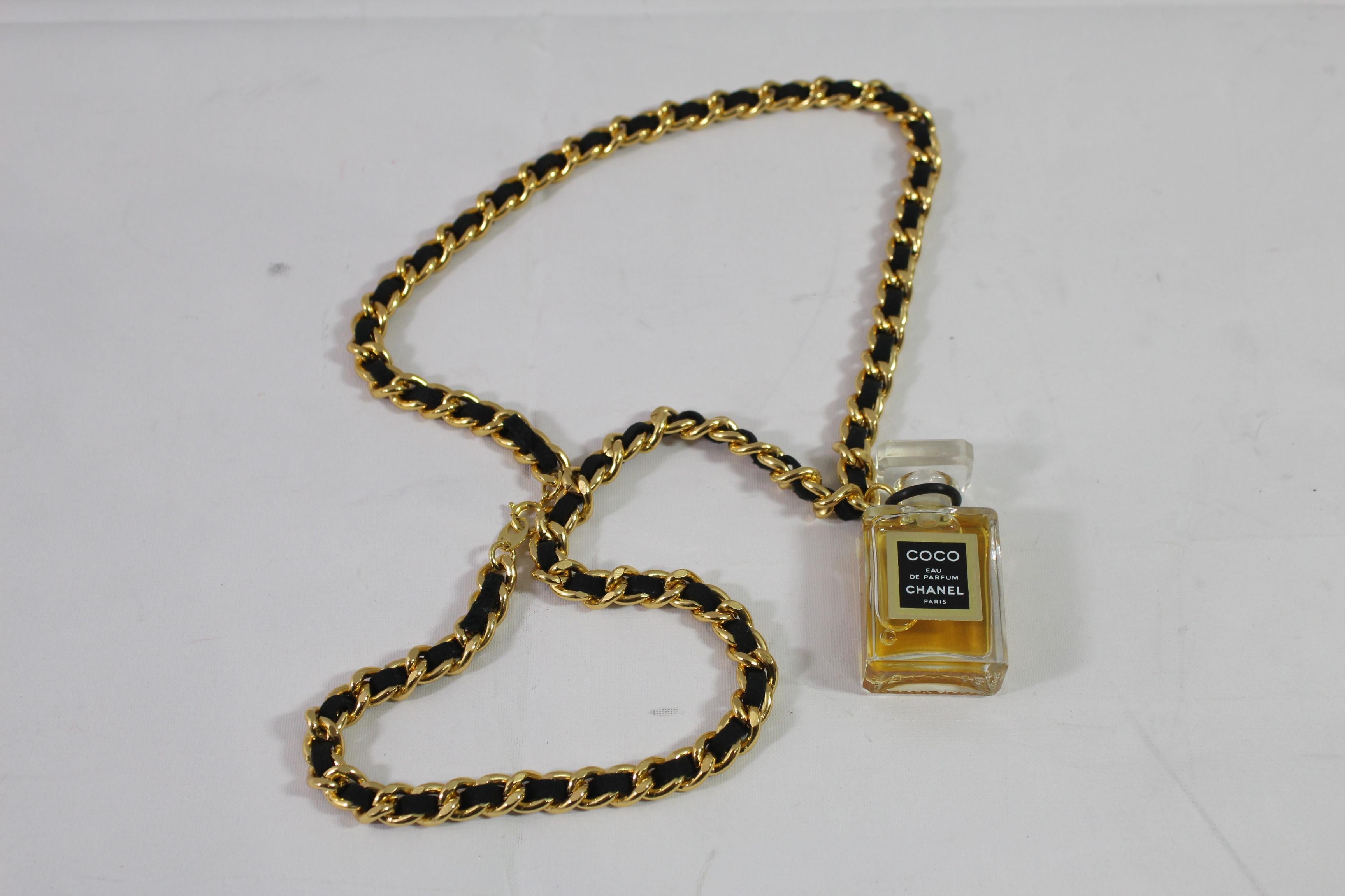 Women's or Men's Chanel Vintage Necklace with Chanel parfum Bottle. 