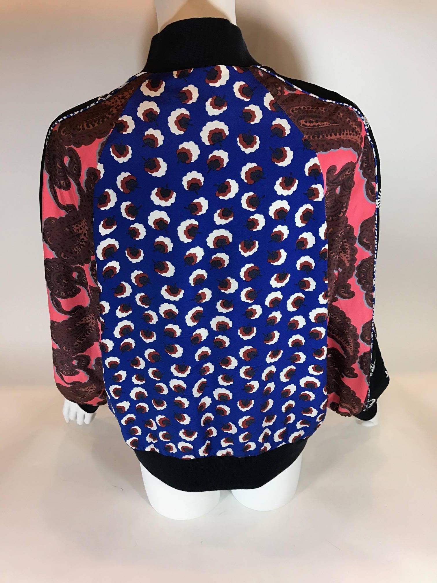 Stella McCartney does it right with this floral and paisley print bomber jacket. Ageless silk jacket framed by ribbed knit trim at the collar, cuffs and hem.
25