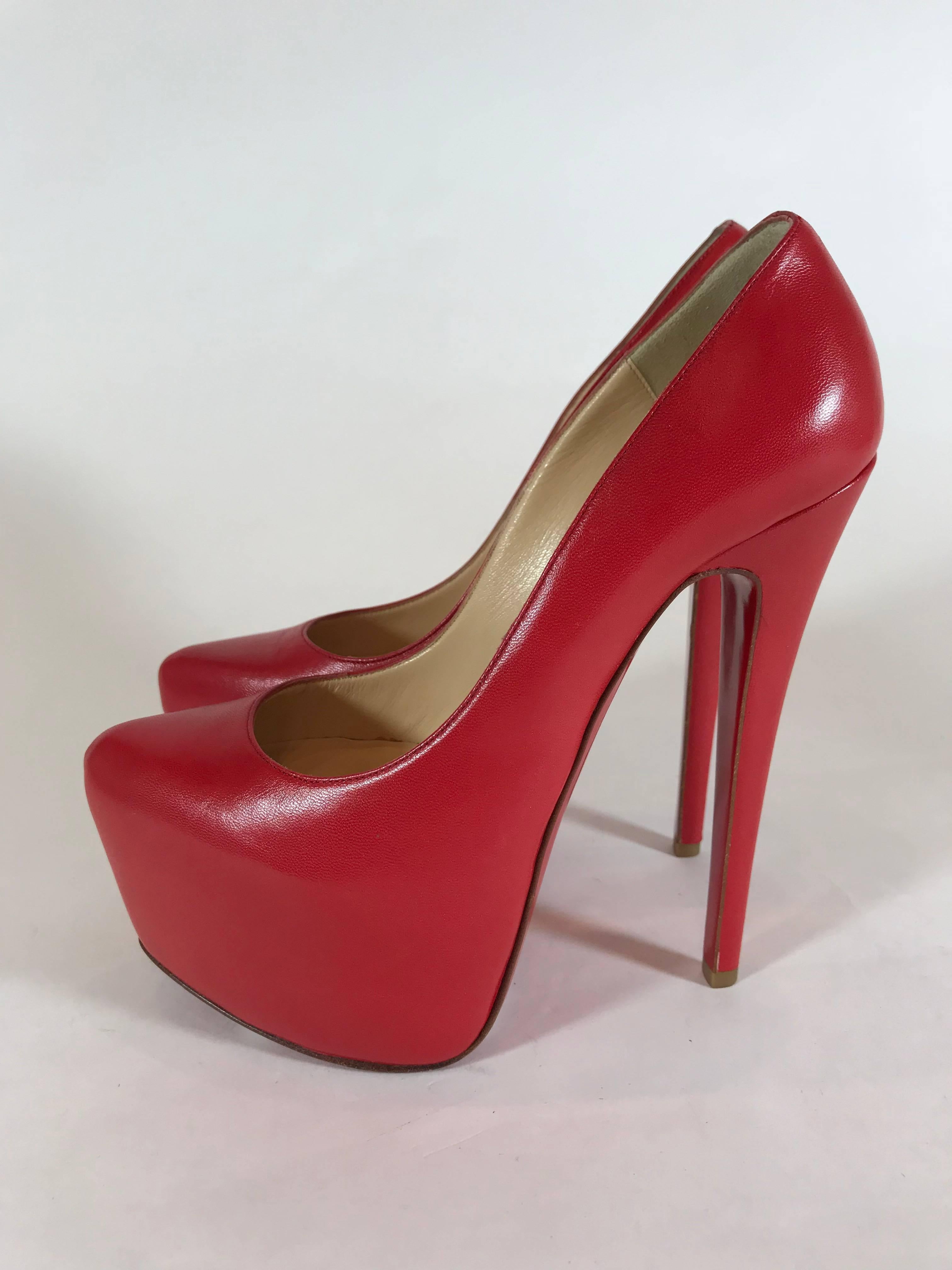 Christian Louboutin red leather 'Daffodil' pump. Soft kidskin leather. Pointed toe with seamed detail. Padded leather insole. Signature glossy red sole. 6