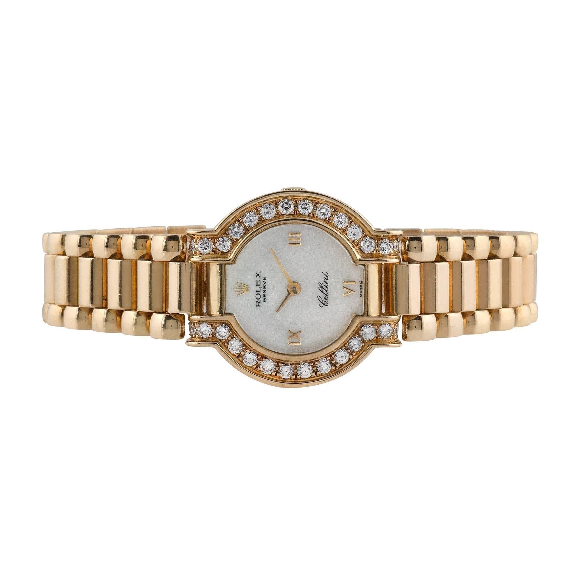 Rolex Cellini 18k yellow gold ladies wristwatch with factory diamonds, reference 2253, circa 1980. This exquisite Rolex features a Cellini 18 karat yellow gold case and bezel that is punctuated with factory diamonds, natural white mother-of-pearl