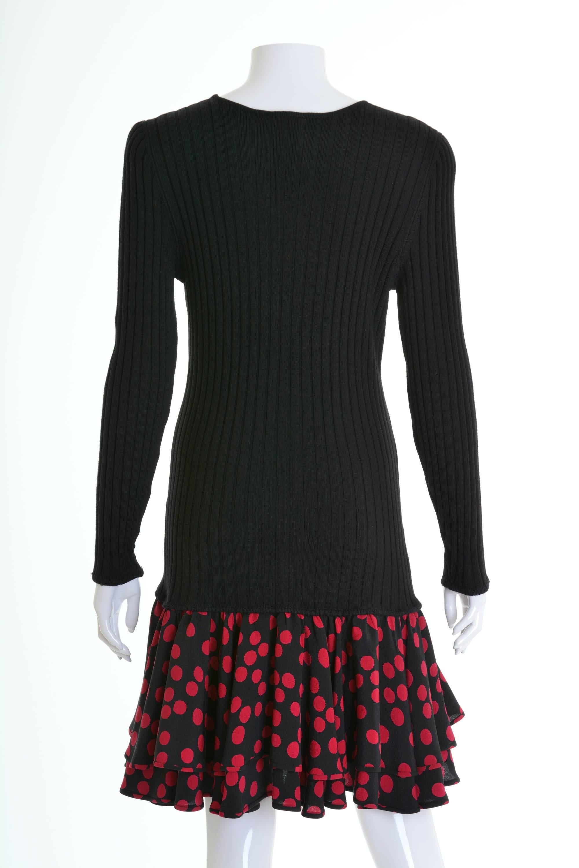 This lovely 1980s Ungaro dress is in a black knitted woolen fabric and has flounces with red magenta polka dots print black fabric. 

Very good vintage condition

Label: Ungaro Parallele Paris - Made in Italy
Fabric: wool/silk 
Color: black/red