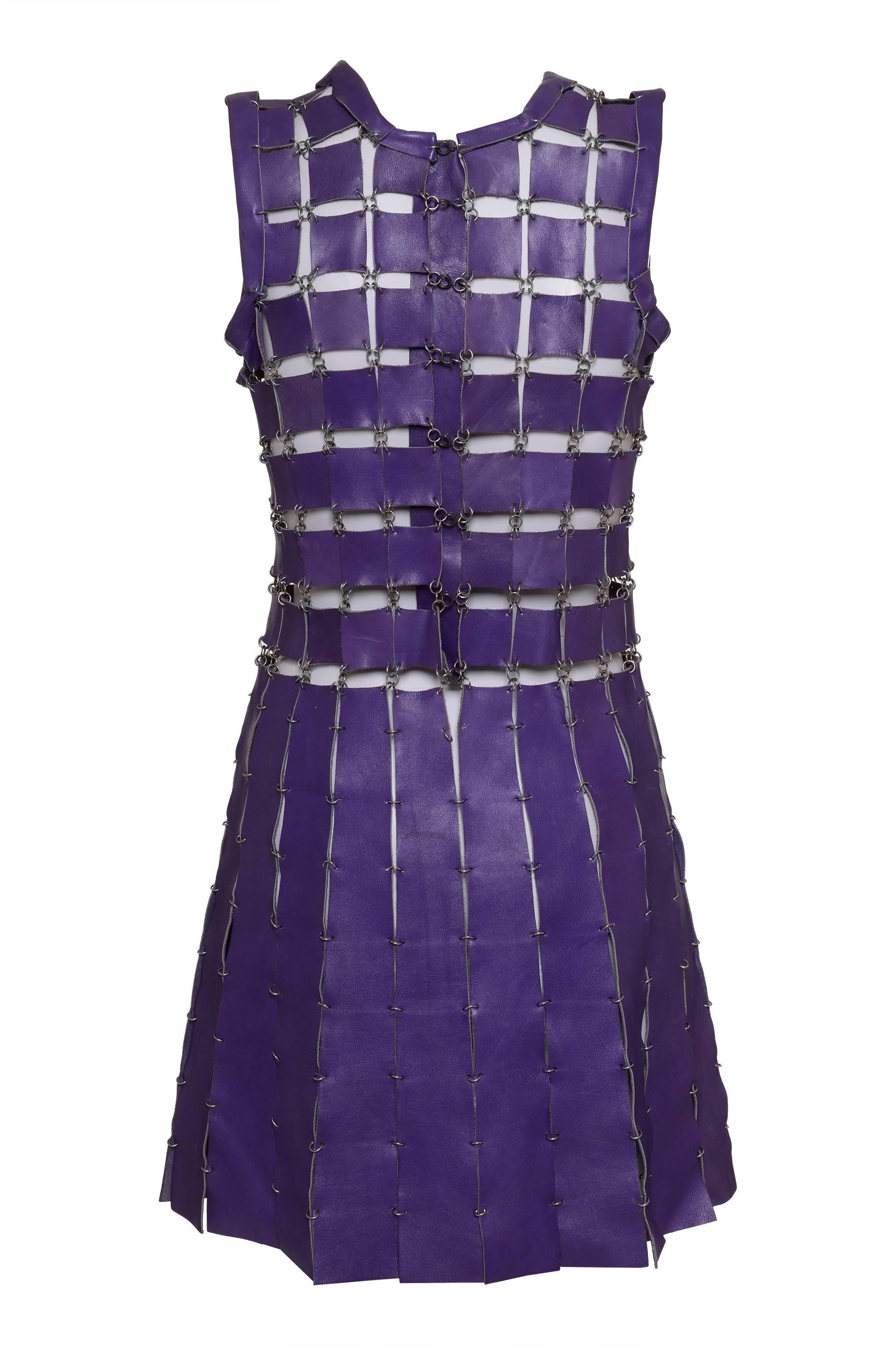 This stunning PACO RABANNE 1960s Dress is in purple leather and silver circular chains to fit each piece of leather, and has spring ring closure. 
Amazing rare and authentic collectible piece.

Excellent vintage condition

Label: PACO RABANNE Paris