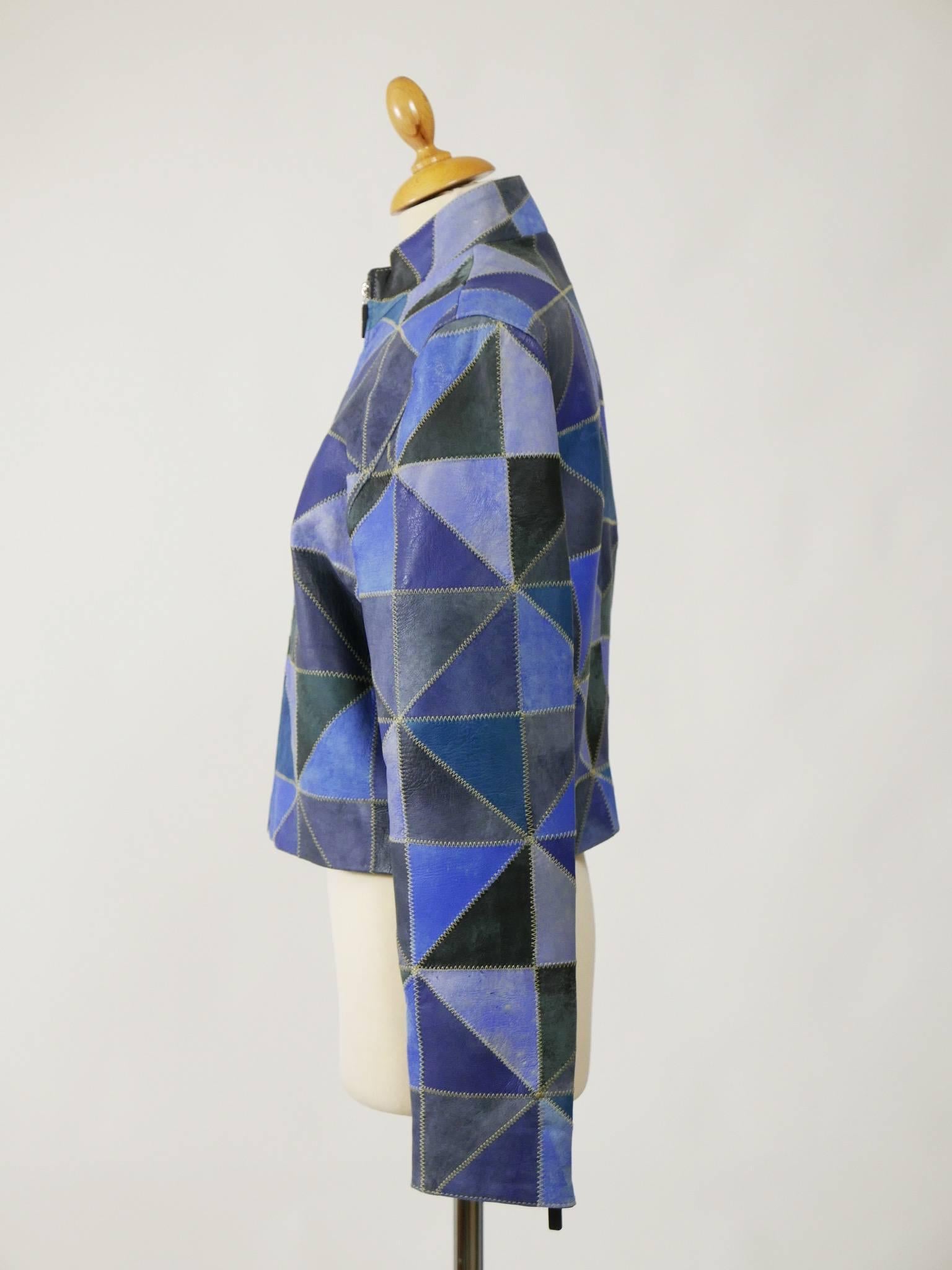 This lovely Kenzo jacket is made with a blue patchwork soft leather. It has long sleeves, mandarin collar, inside pockets, zip closure and is fully lined.

Good vintage condition. 

Label: Kenzo Jeans
Fabric: leather
Color: