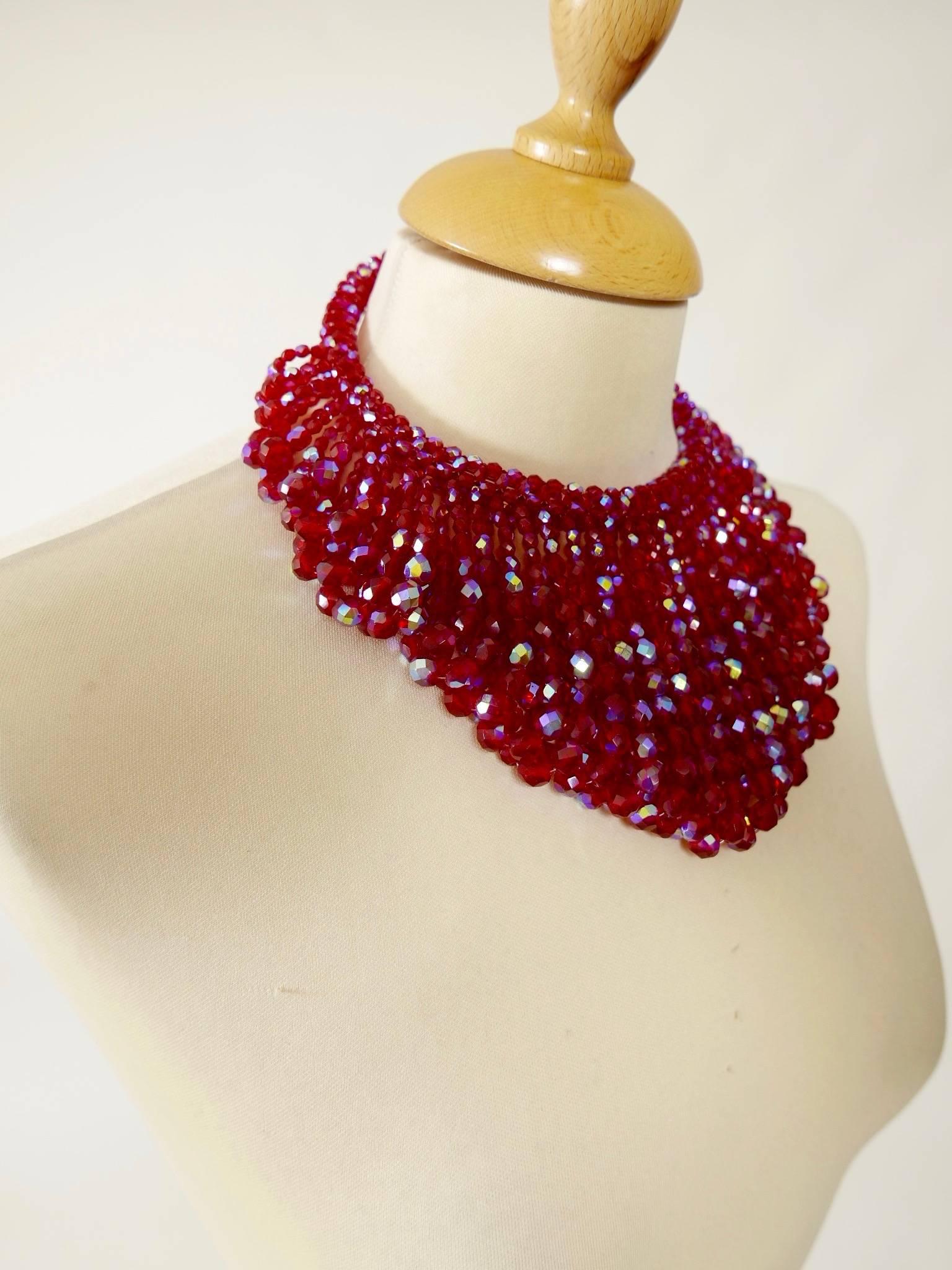 This amazing and rare 1960s Coppola e Toppo chocker necklace is in red aurora borealis crystal facetad glass beadeds. 
A rare and amazing collector's piece !!!
The necklace is flexible and adaptable to all measures. 

Brother and sister jewelry