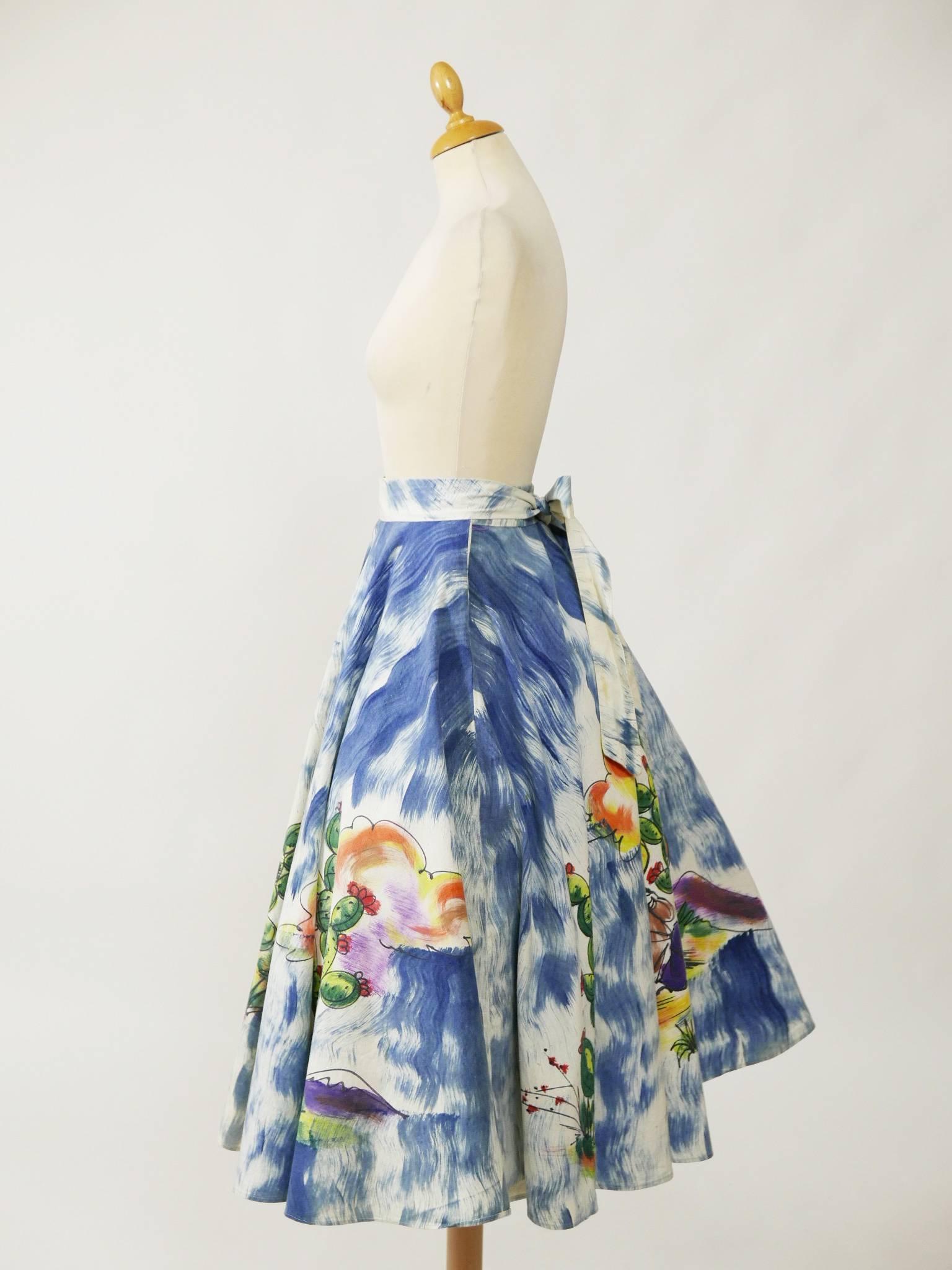 This amazing 1950s full circle skirt is in a gorgeous handpainted mexican print cotton fabric. It has ties in the front with hooks that attach in the back.

Good vintage condition 

Petticoat worn under the skirt for added volume

Label: