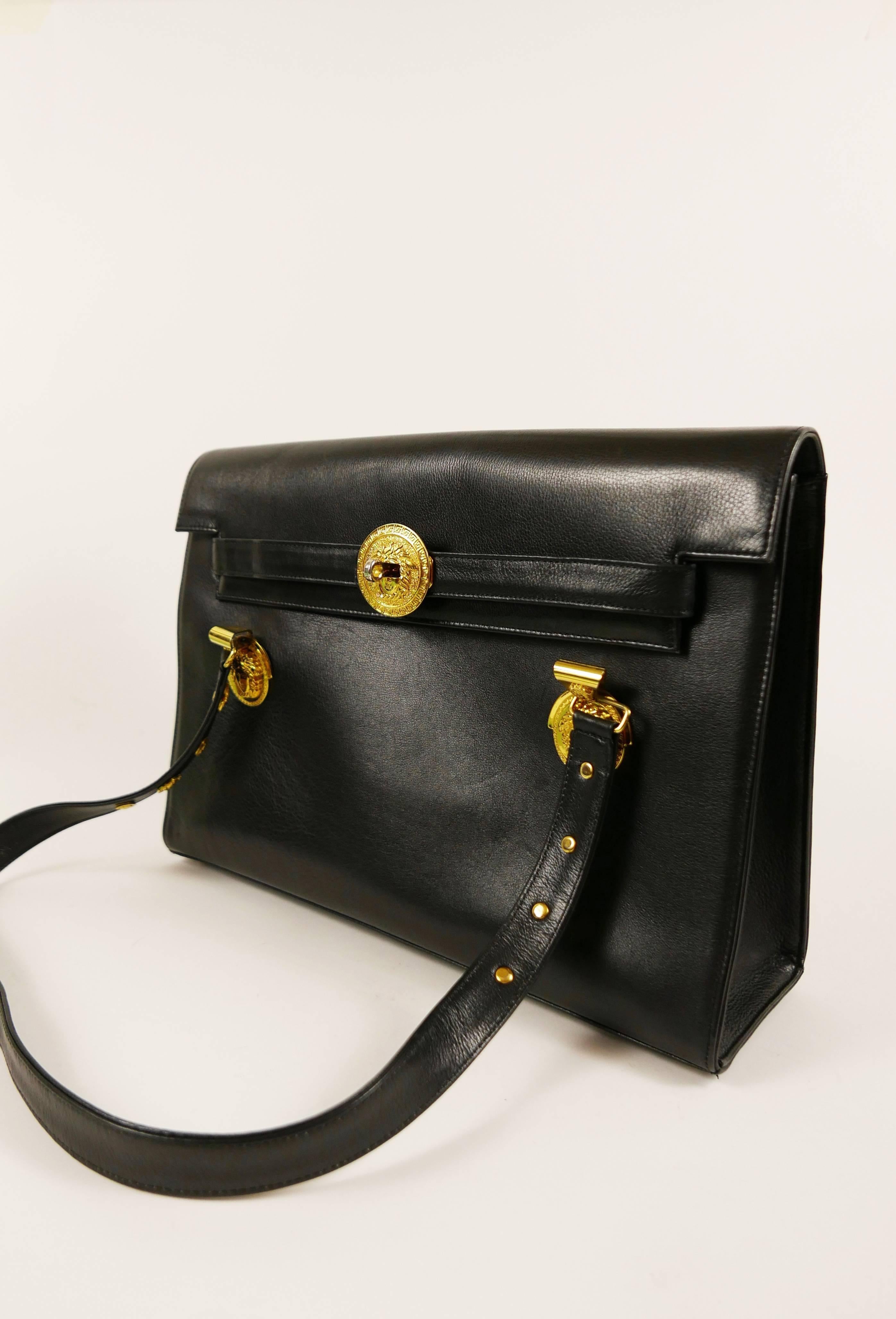 1990s GIANNI VERSACE Black Leather Kelly Shoulder Bag with Gold Hardware In Excellent Condition In Milan, Italy