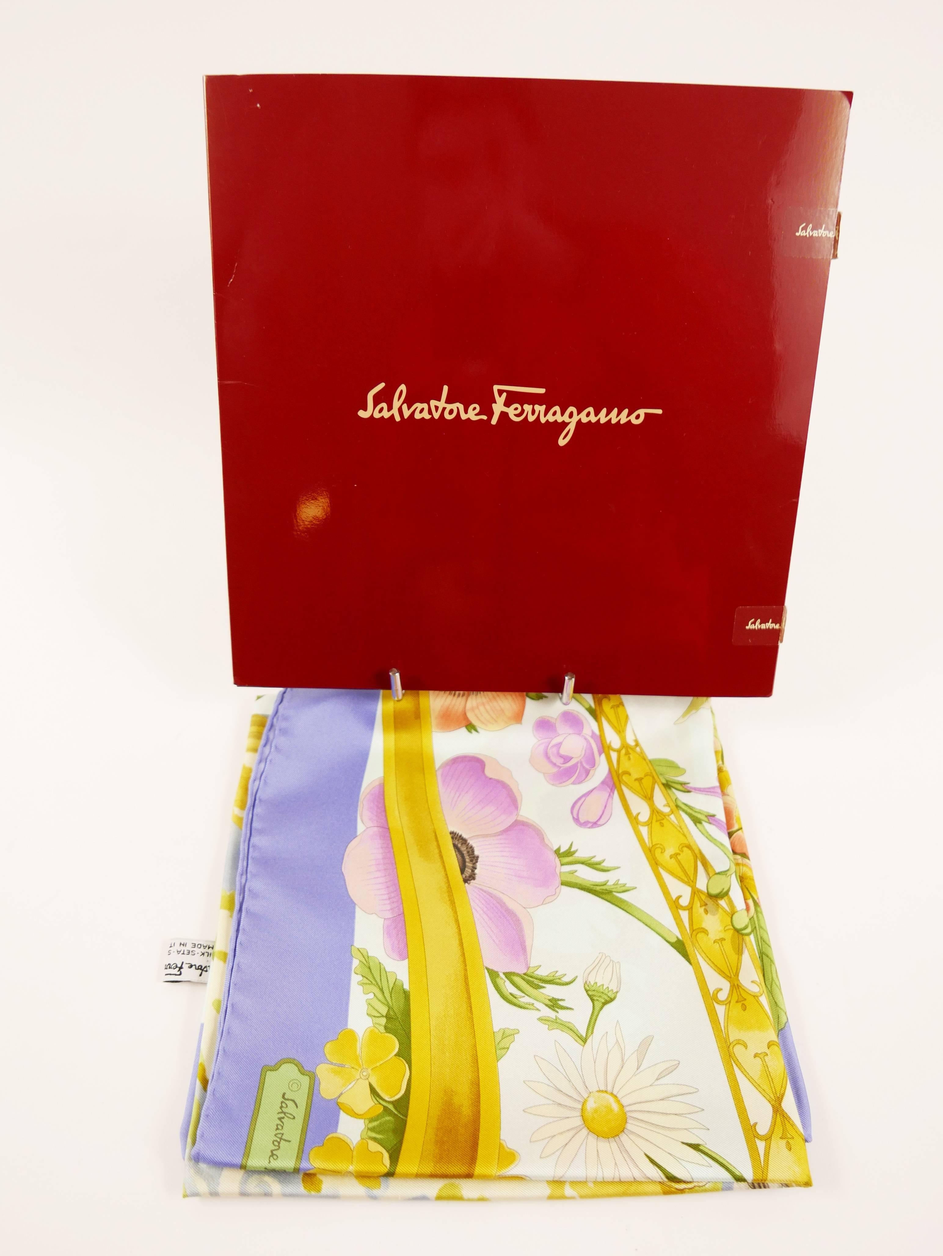 This amazing Salvatore Ferragamo scarf is 100% silk and has light blue and pink  background with world nature, animal, birds and floral print, with hand-rolled edging. 

Mint condition ( like new )with original box

MEASUREMENTS:
34 " x 35