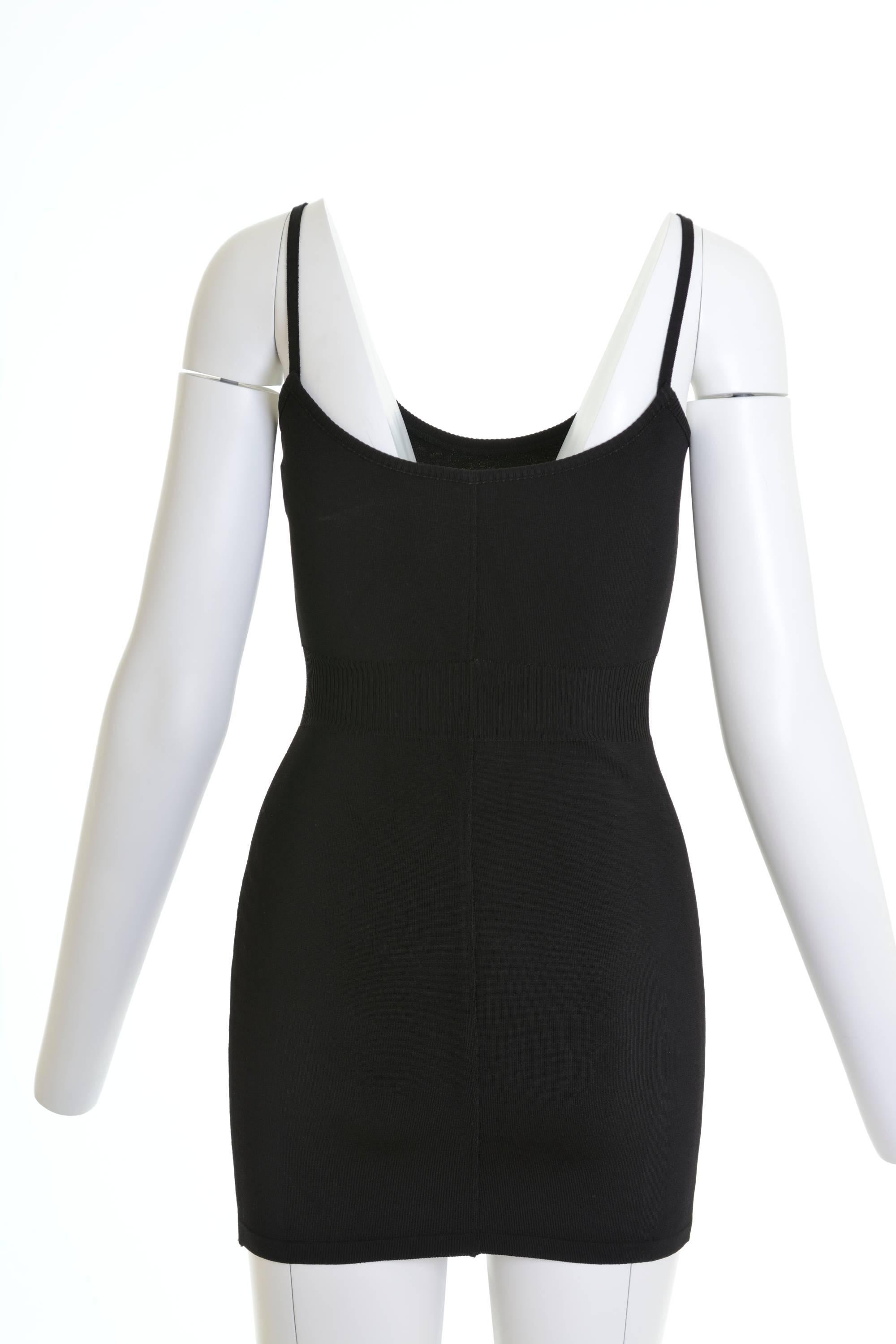 Azzedine Alaïa mini dress in a black viscose stretch fabric, with typical Alaïa's signature body. Spaghetti straps and pencil skirt.

Very good vintage condition

Label: Alaïa-Paris (Made in Italy)
Fabric: viscose/polyamide
Colour: