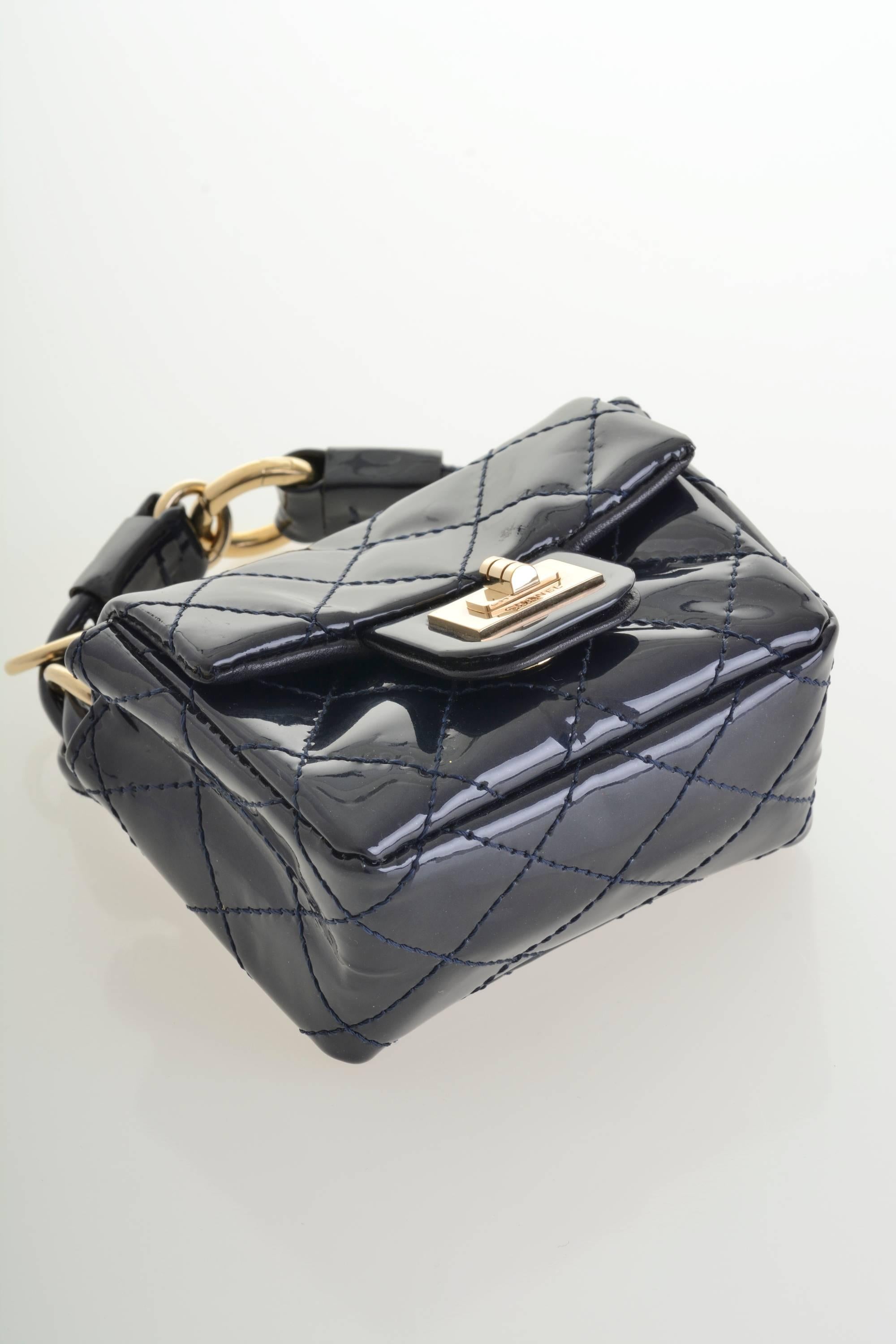 CHANEL Black Patent Leather Quilted Reissue Mini Belt Bag In Excellent Condition In Milan, Italy