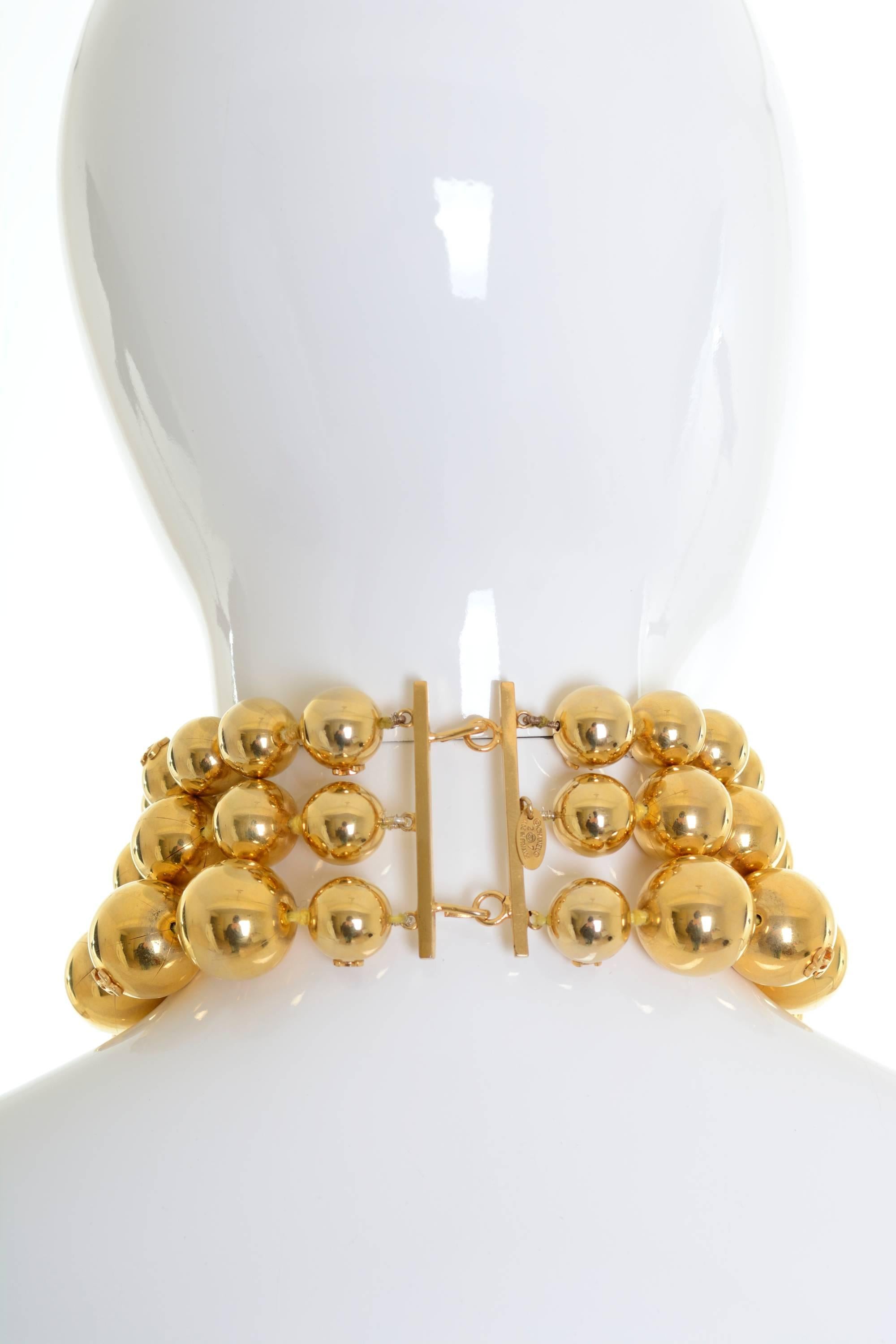 1990s Chanel Gold-Tone Beaded Triple Strand Choker Necklace In Good Condition In Milan, Italy