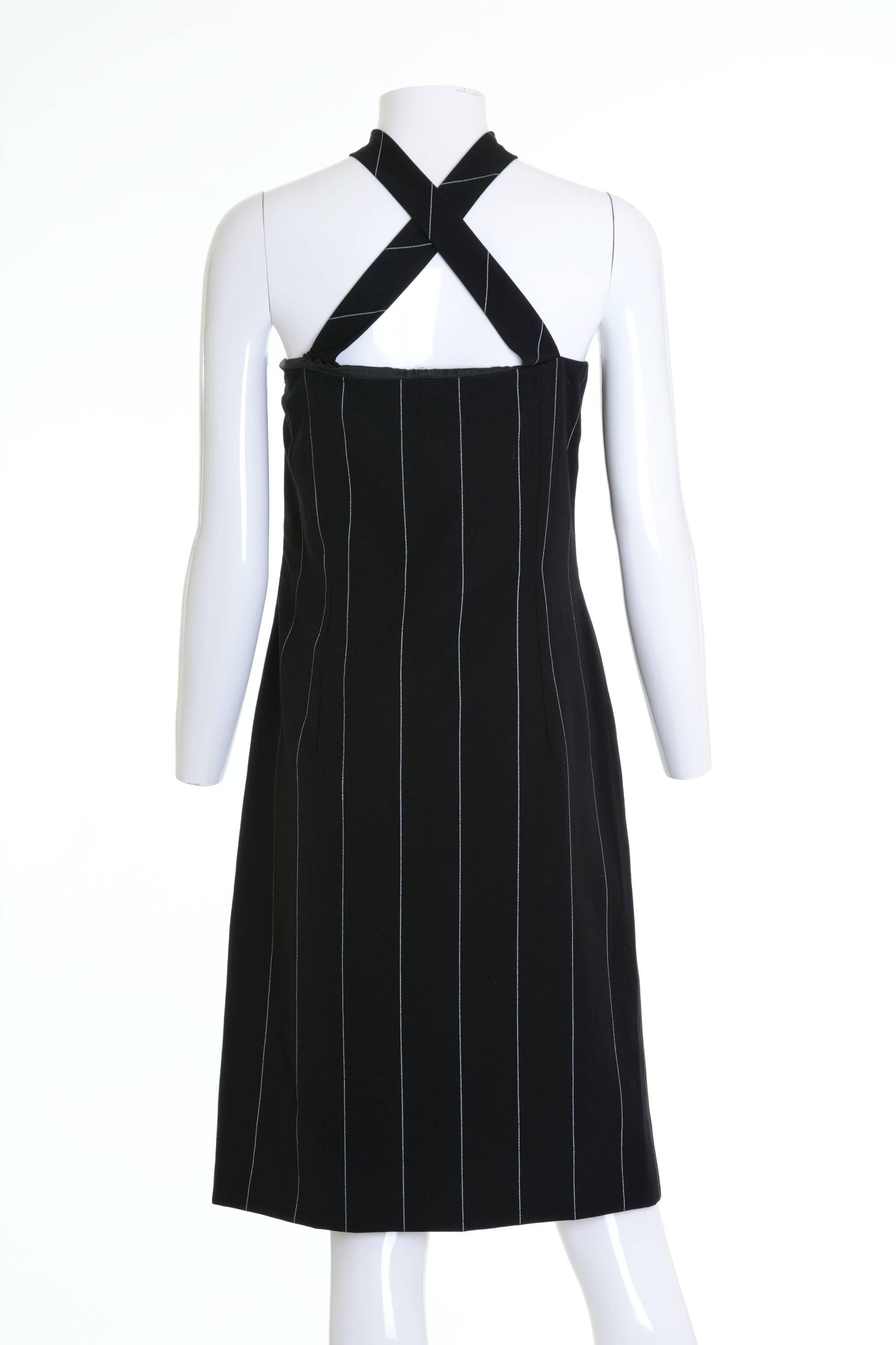 1980-1990s GIANNI VERSACE Couture pinstripe dress strapless with a built in boned corset underneath and a wrap neckline embellishment adding drama to the simple sheath design. Side zip closure, and is fully lined 

Excellent Vintage Condition