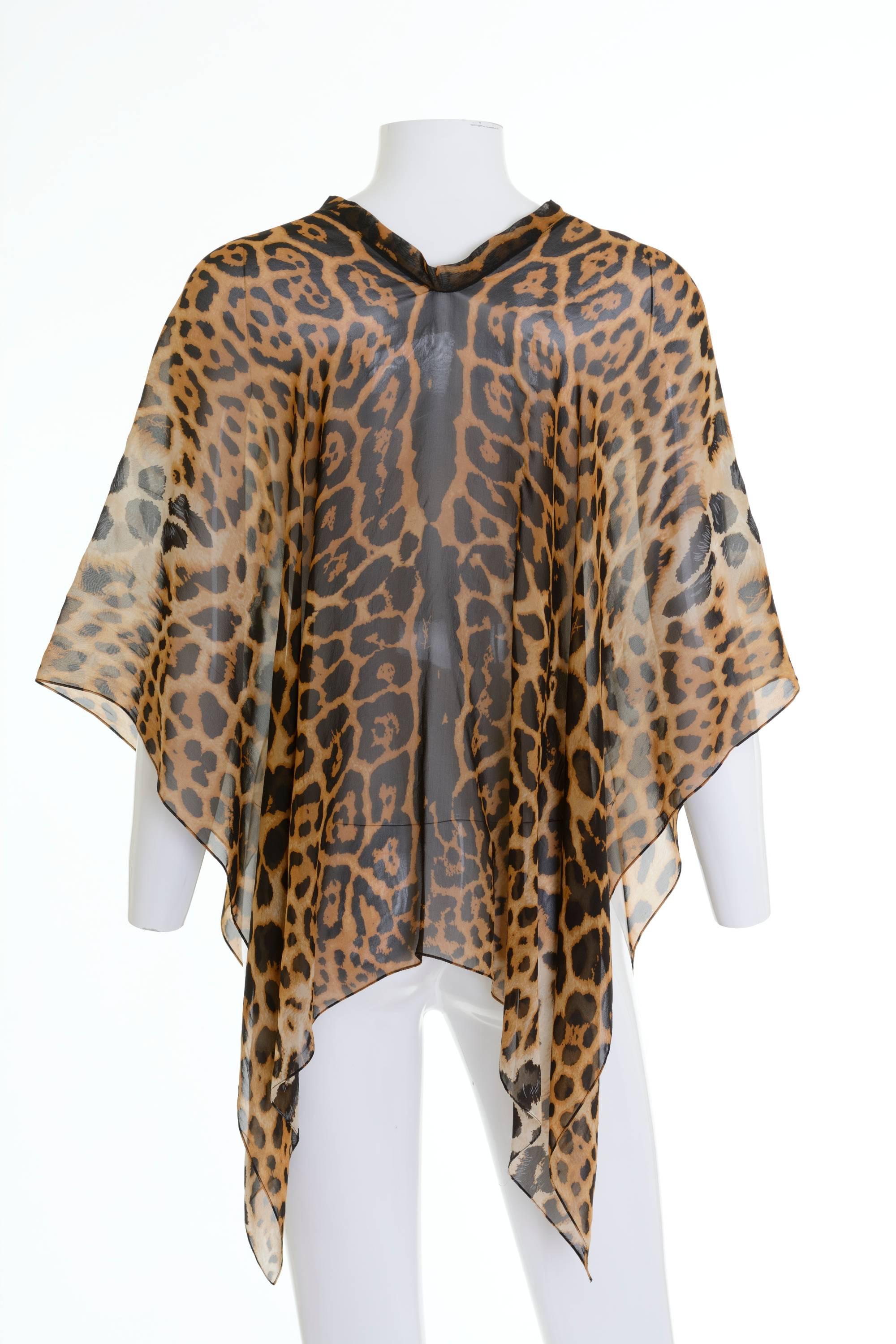This lovely Yves Saint Laurent Rive Gauche Sheer Silk Leopard Print Poncho is Perfect beach cover up. Made in Italy 

Excellent Condition 

Lebel: Yves Saint Laurent Rive Gauche 
Material: Silk 
Color: Brown, Black, White 

Measurements 
Total