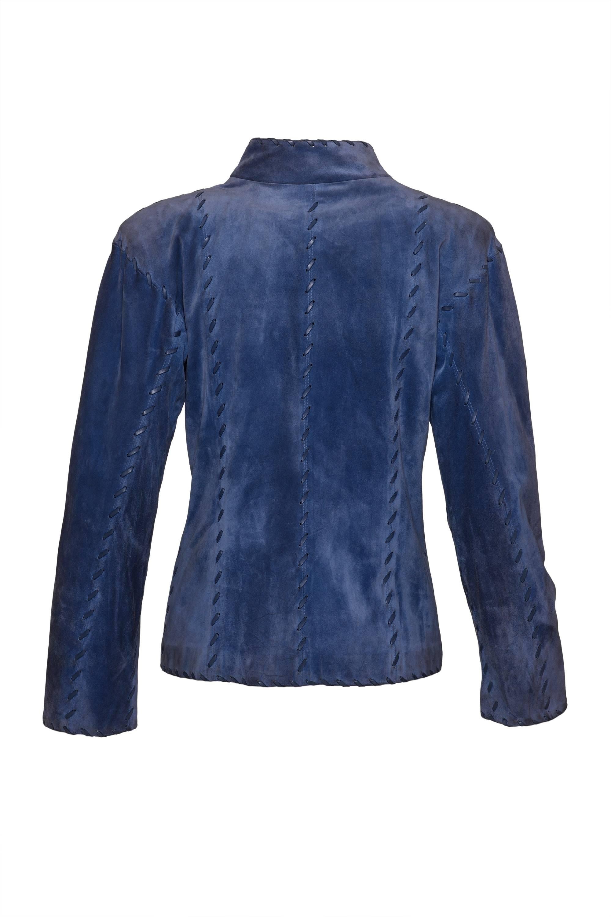 This gorgeous 1980s Yves Saint Laurent jacket is in blue avio suede soft leather. It has metal buttons closure, fully lined in blue avio satin, Made In France  

Good Vintage condition ( with a stain on a sleeve)

Label: Yves Saint Laurent Rive