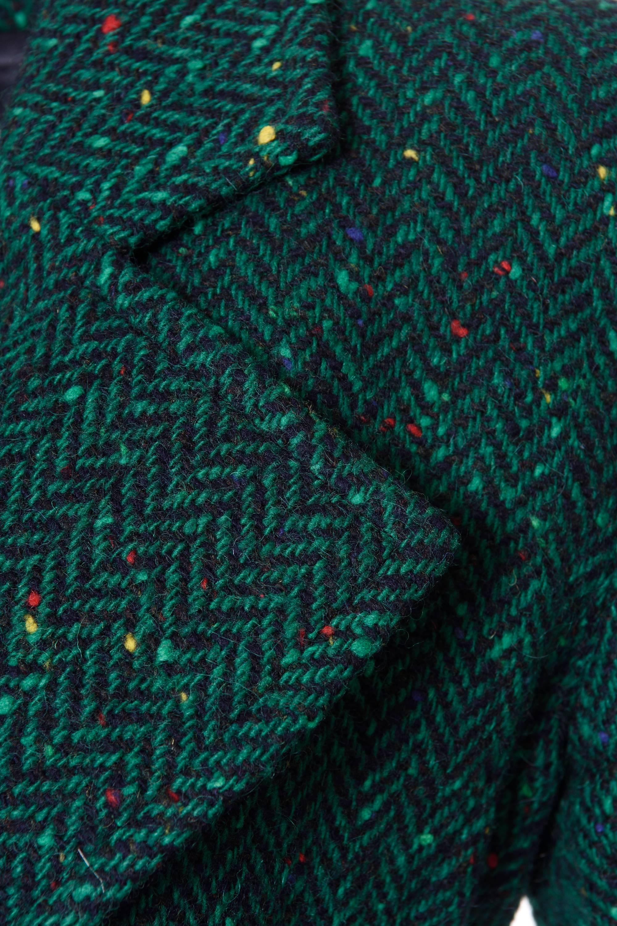 green herringbone suit