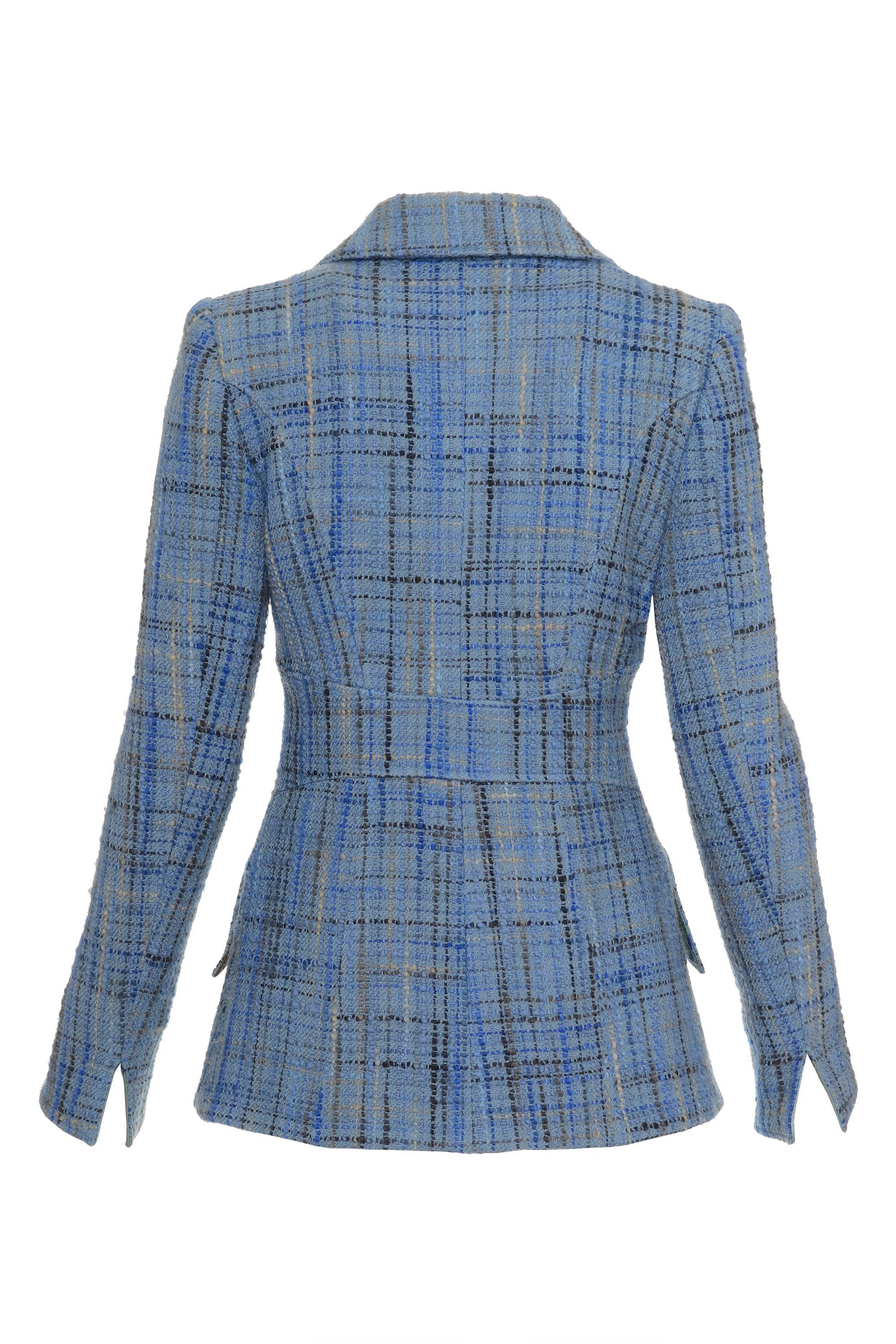 This blue winter check tweed blazer Jacket by CHRISTIAN LACROIX has two frontal slashed pockets with flap, double-breasted closure using six buttons embossed and laminated tailor seam, two-pieces sleeves, back armhole princess seam and an horizontal
