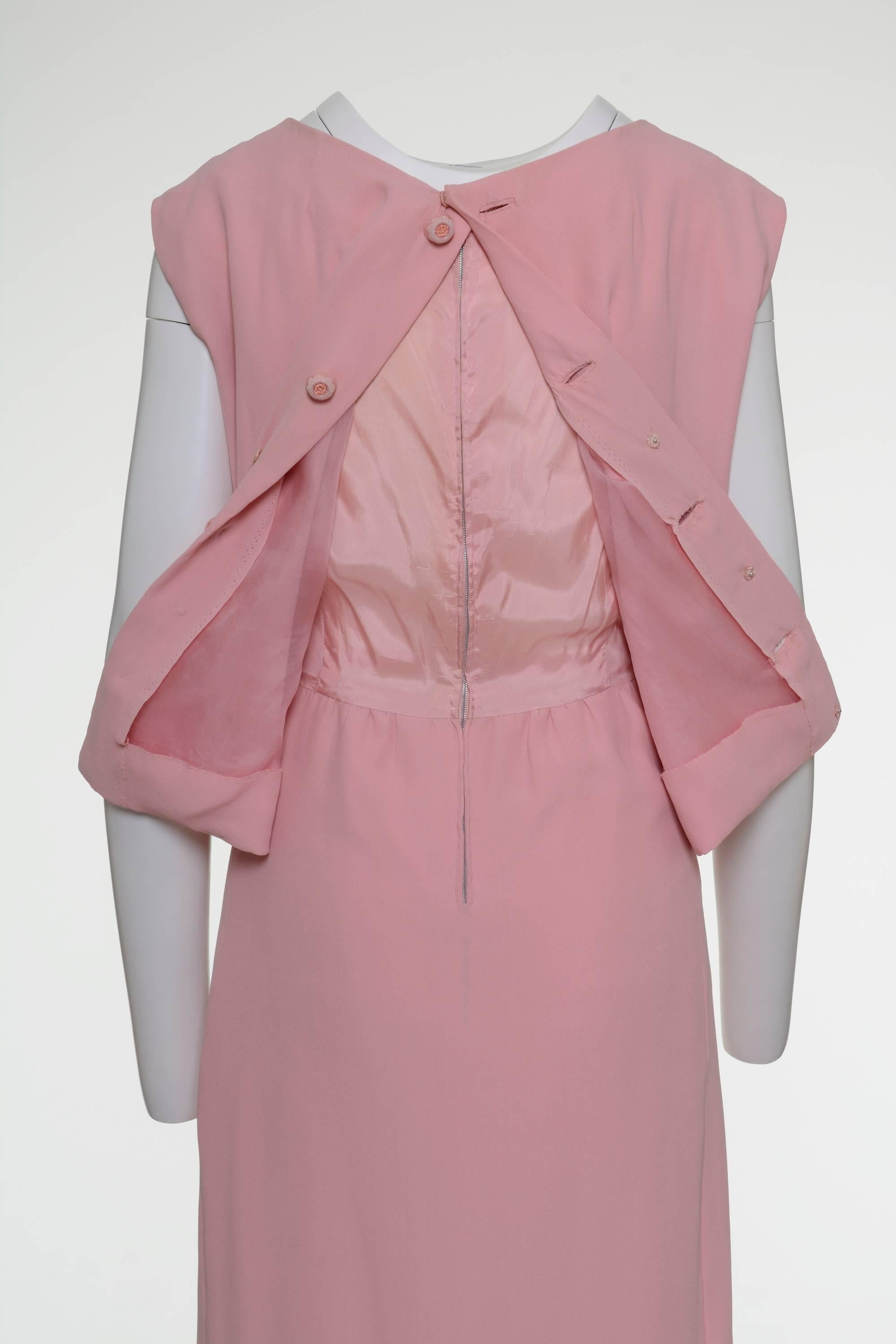 Women's 1960s Pink Cocktail Dress with black plumage on a stole  For Sale