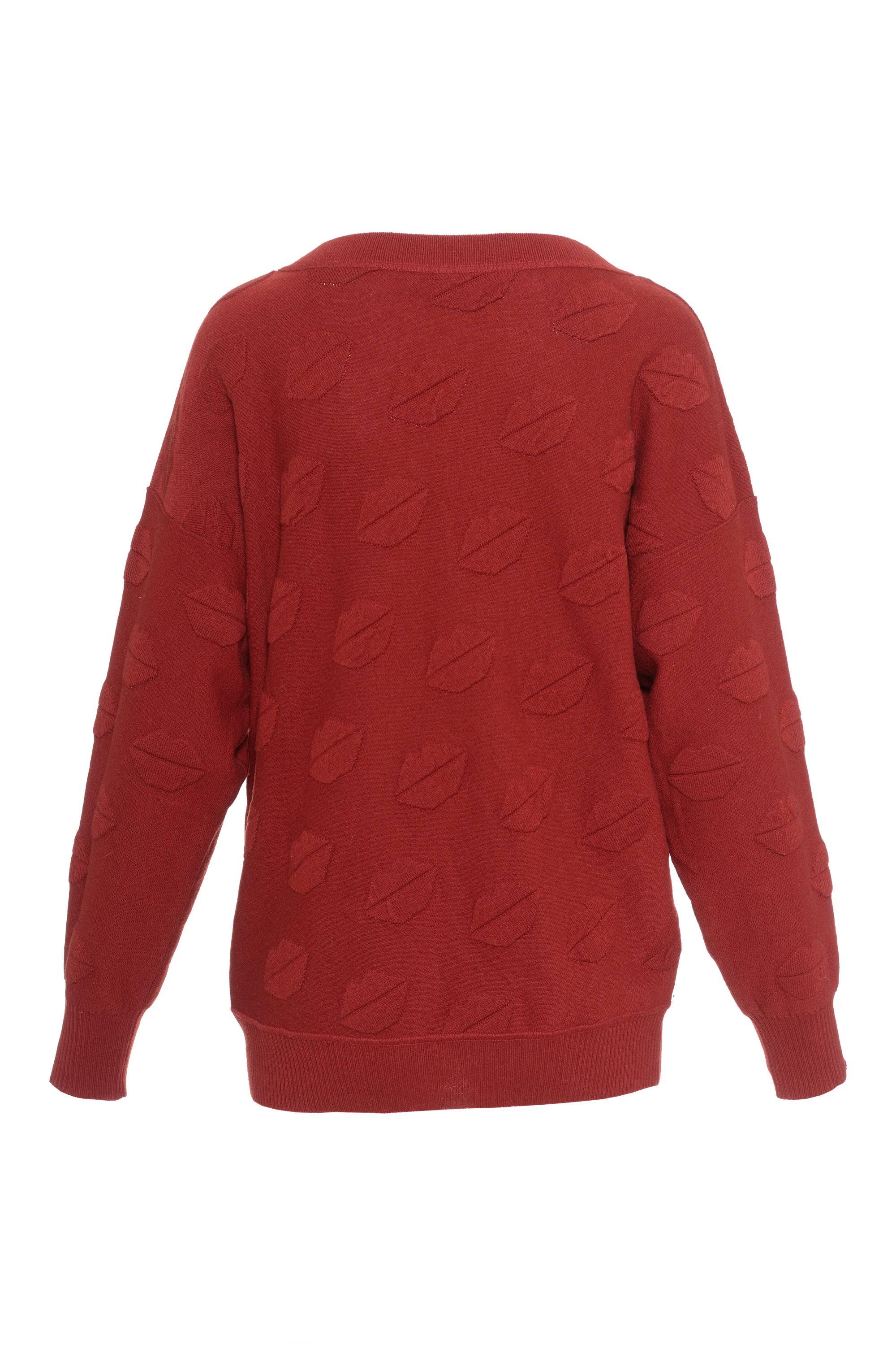 This lovely Sonia Rykiel sweater is in a maroon cashmere and wool knitted fabric with gorgeous lips texture.

Excellent condition

Label: Sonia Rykiel - Made in Italy
fabric: wool/cashmere
Color: maroon

Measurements (unstretched):
Label size