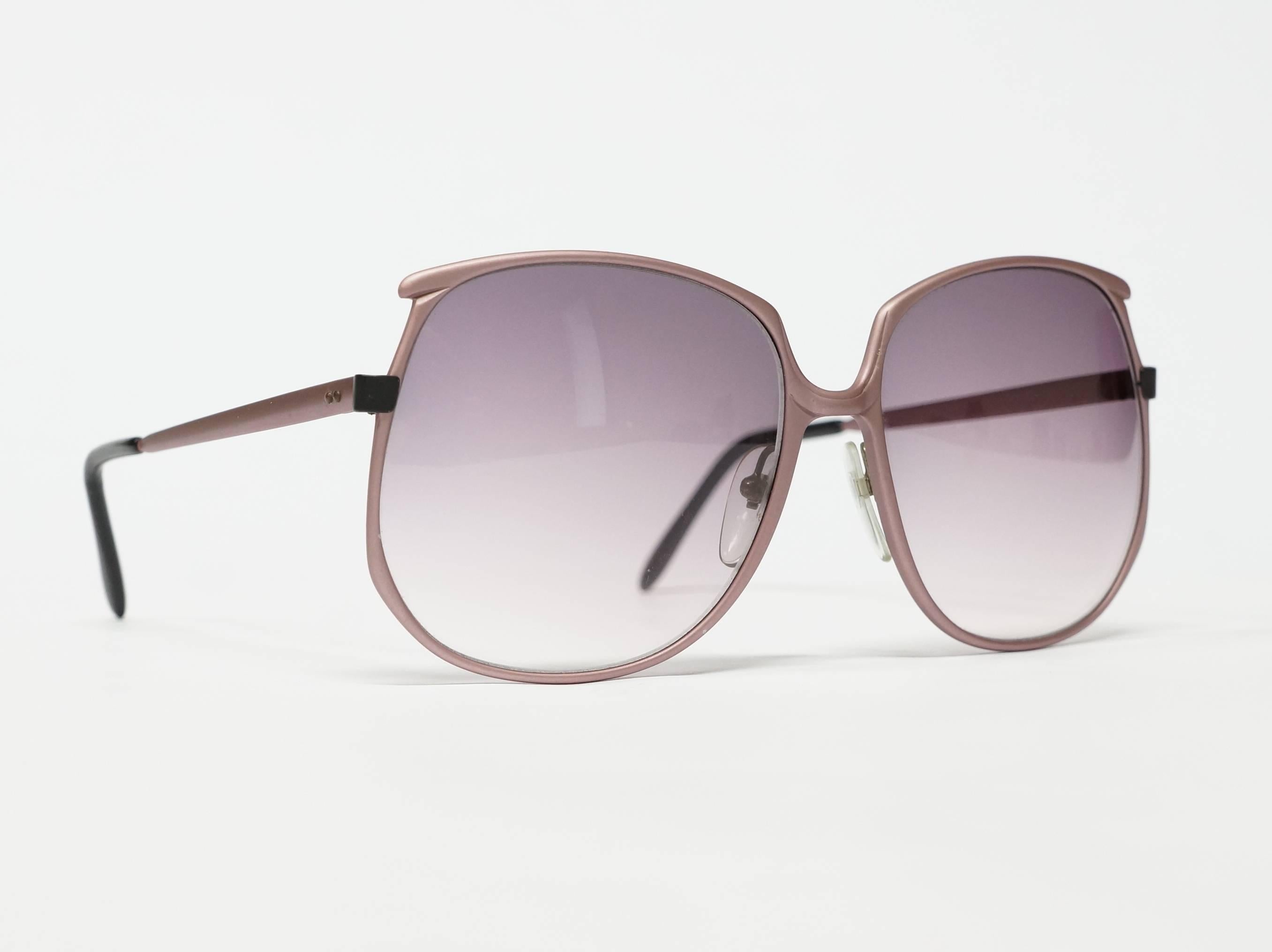 1980s Italian sunglasses by Lamborghini. Matte rose oversized metal frame in new old stock condition.

model: 3020

approximate dimensions: 
temple length: 140mm - 5 1/2