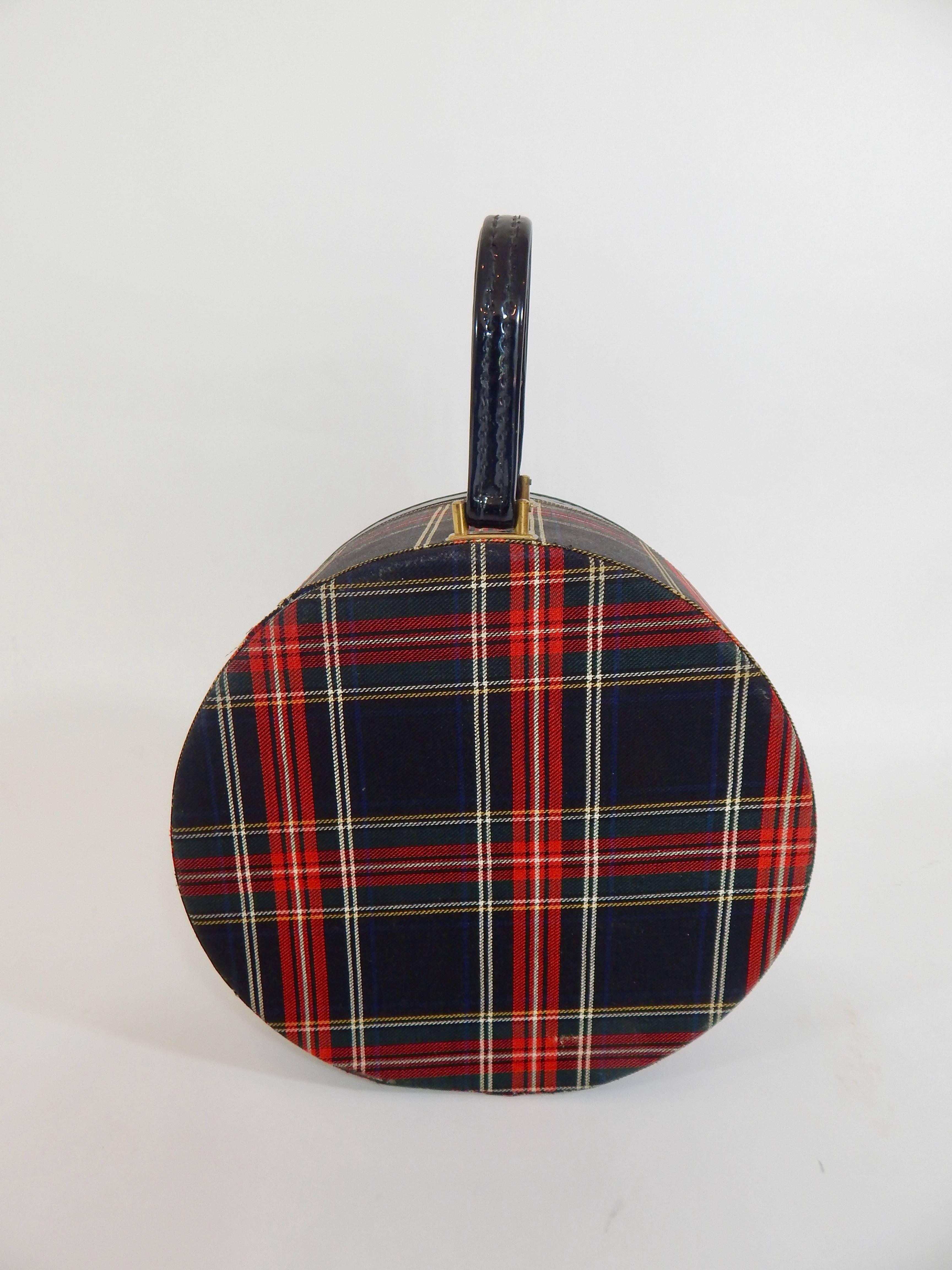 1950s Tartan Plaid Hat Box or Carrying Case. Black Patent Leather Trim and Handle. Excellent Condition. 