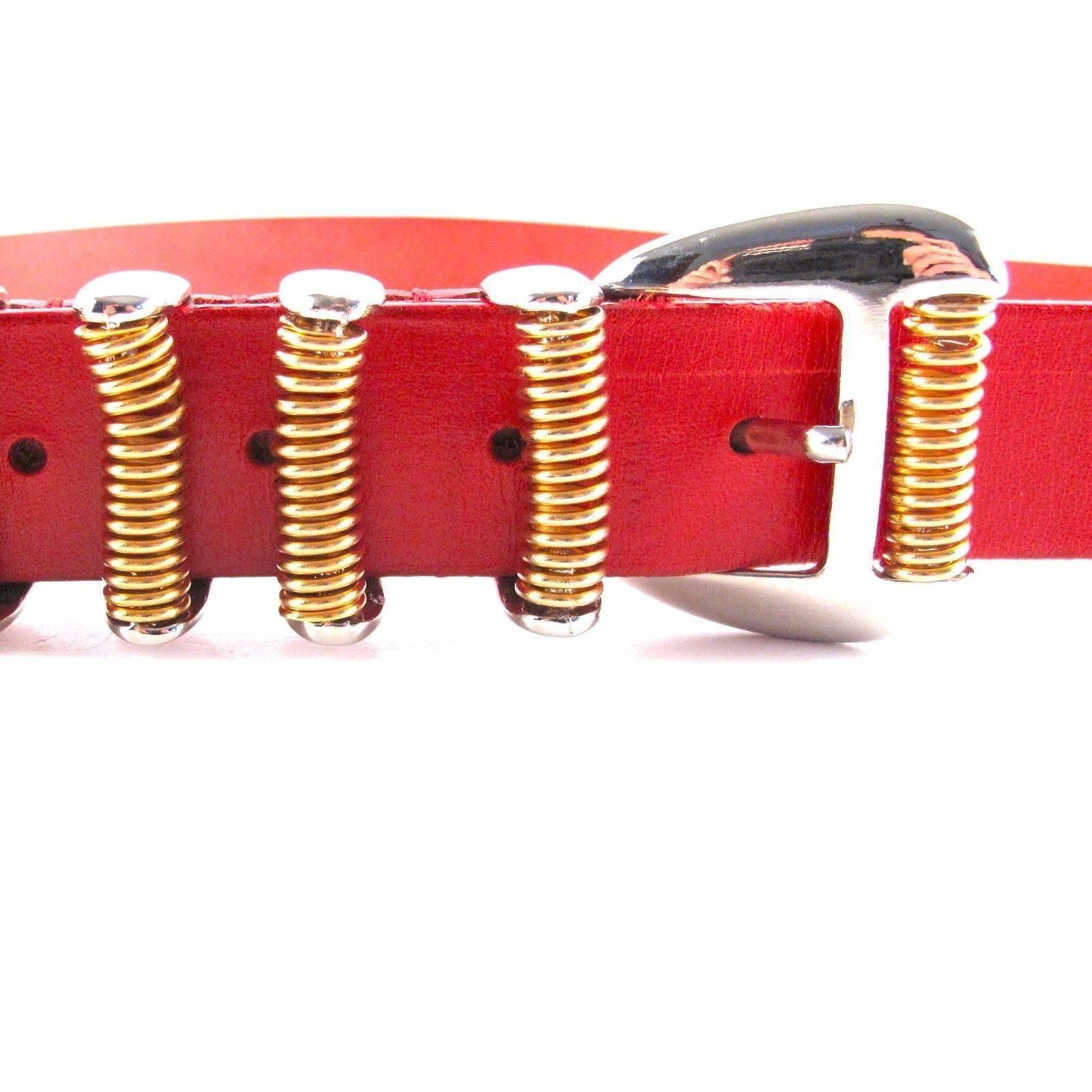 Balmain - Leather Belt

Color: Red

Material: Leather

Size:  40 - Large - Fits a 30" to 36" waist / hips

------------------------------------------------------------

Details:

- silver tone buckle

- gold tone coil