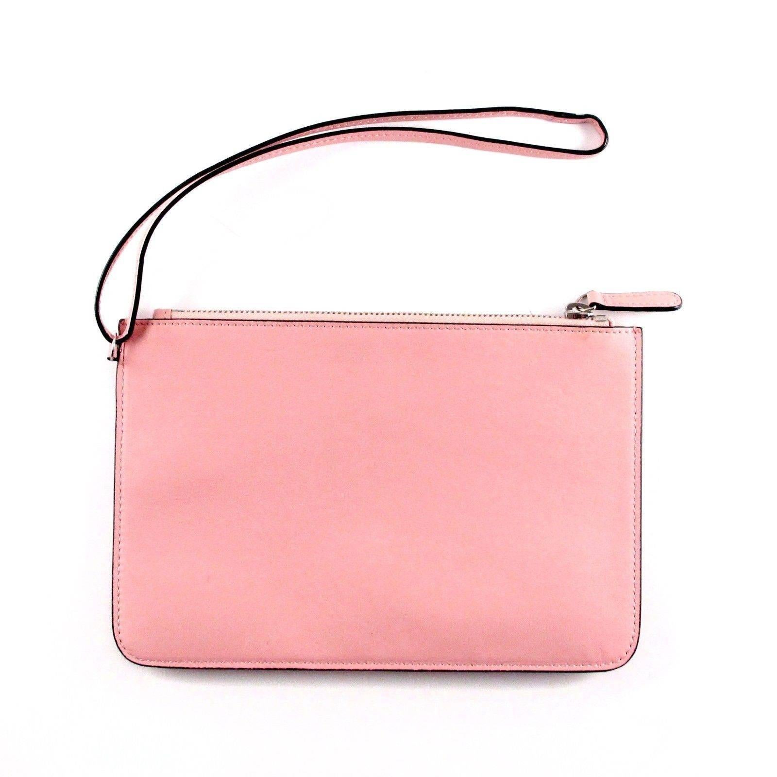 Color: Pink
Material: Leather

------------------------------------------------------------

Details:

- silver tone hardware

- zip top closure

- red lining

- item # AA1288

Condition: Good condition - gently used

small scuff