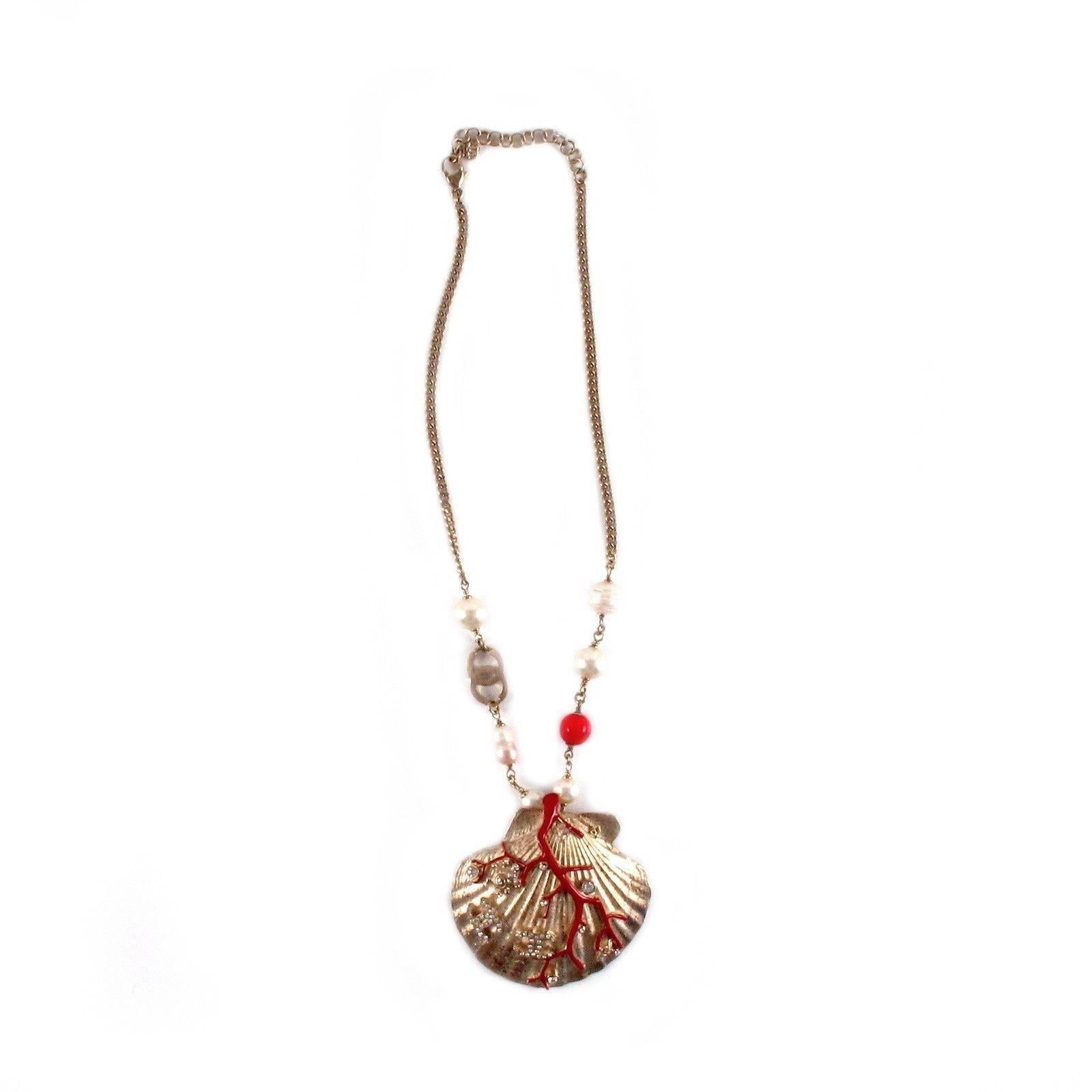 Color: Gold

Material: Metal

------------------------------------------------------------

Details:

- gold tone hardware

- CC logos throughout

- red coral accent at shell

- crystal details throughout

- pearl & red beads at